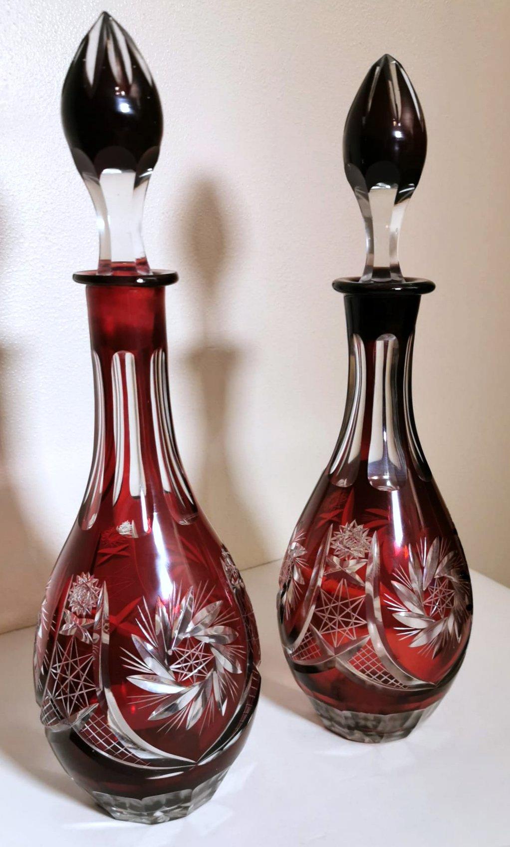 We kindly suggest you read the whole description, because with it we try to give you detailed technical and historical information to guarantee the authenticity of our objects.
Spectacular and striking pair of ruby red crystal bottles; made between