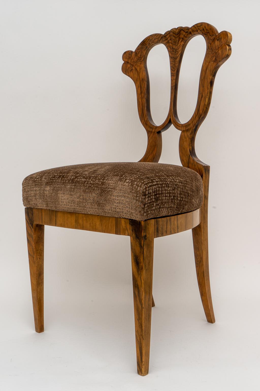 This stylish and chic Biedermeier side chair date to the early part of the 19th century and it’s the perfect scale as a desk chair or perhaps as a vanity table chair. The piece retain a label on the underside of the seat for T.Rohan and interior