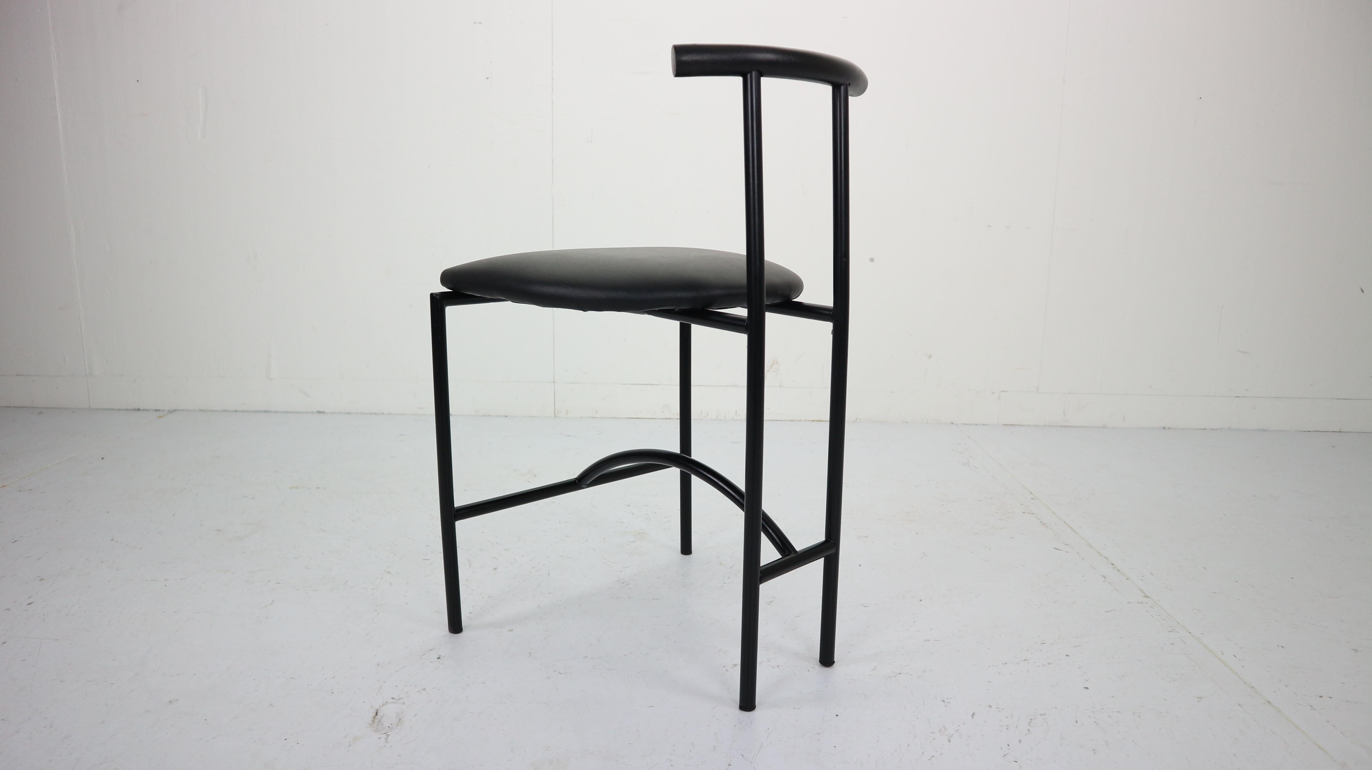 A Tokyo chair designed by Rodney Kinsman for Italian manufacturer, Bieffeplast. Original, 1980s edition. Powder coated tubular black frames with black rubber back rests and black newly upholstered faux leather seatings. 
Available quantity of the