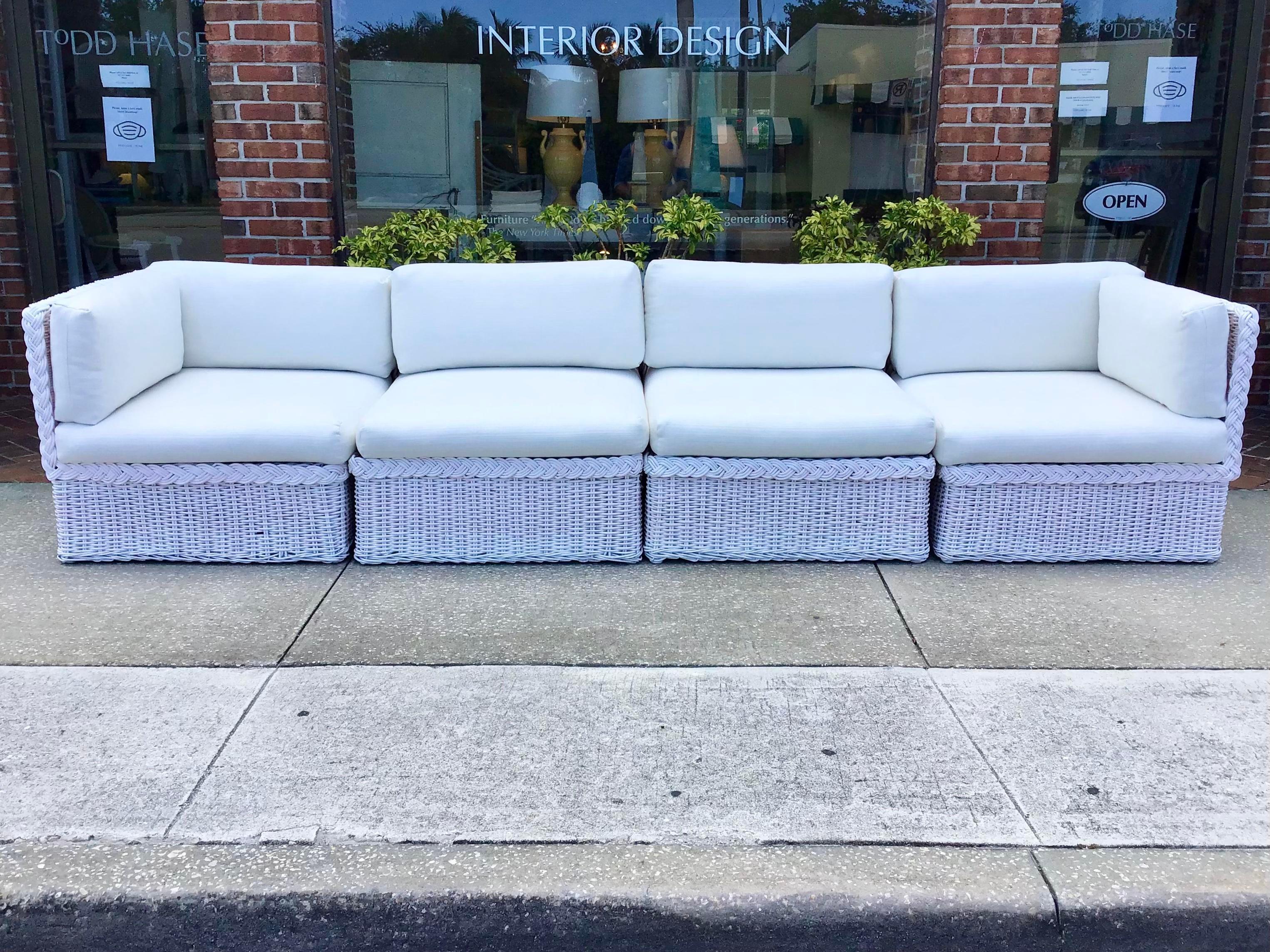 Fantastic Bielecky Brothers newly lacquered and upholstered Boho Chic rattan four piece modular sectional. All new Todd Hase Upholstery and Todd Hase Textiles High Performance White. So much flexibility with this classic design. Use it as a long