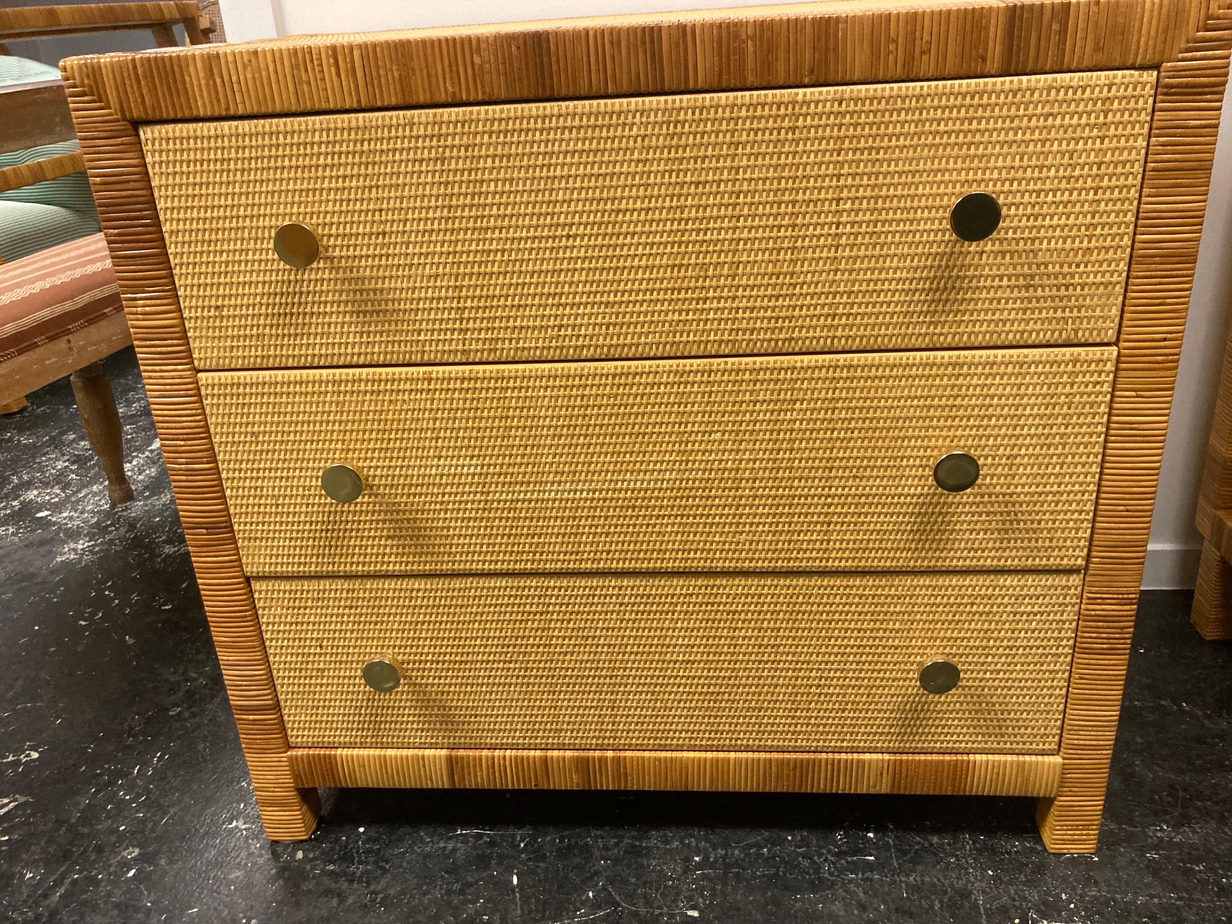 Bielecky Brothers three drawer chest in rattan and cane with brass pulls...