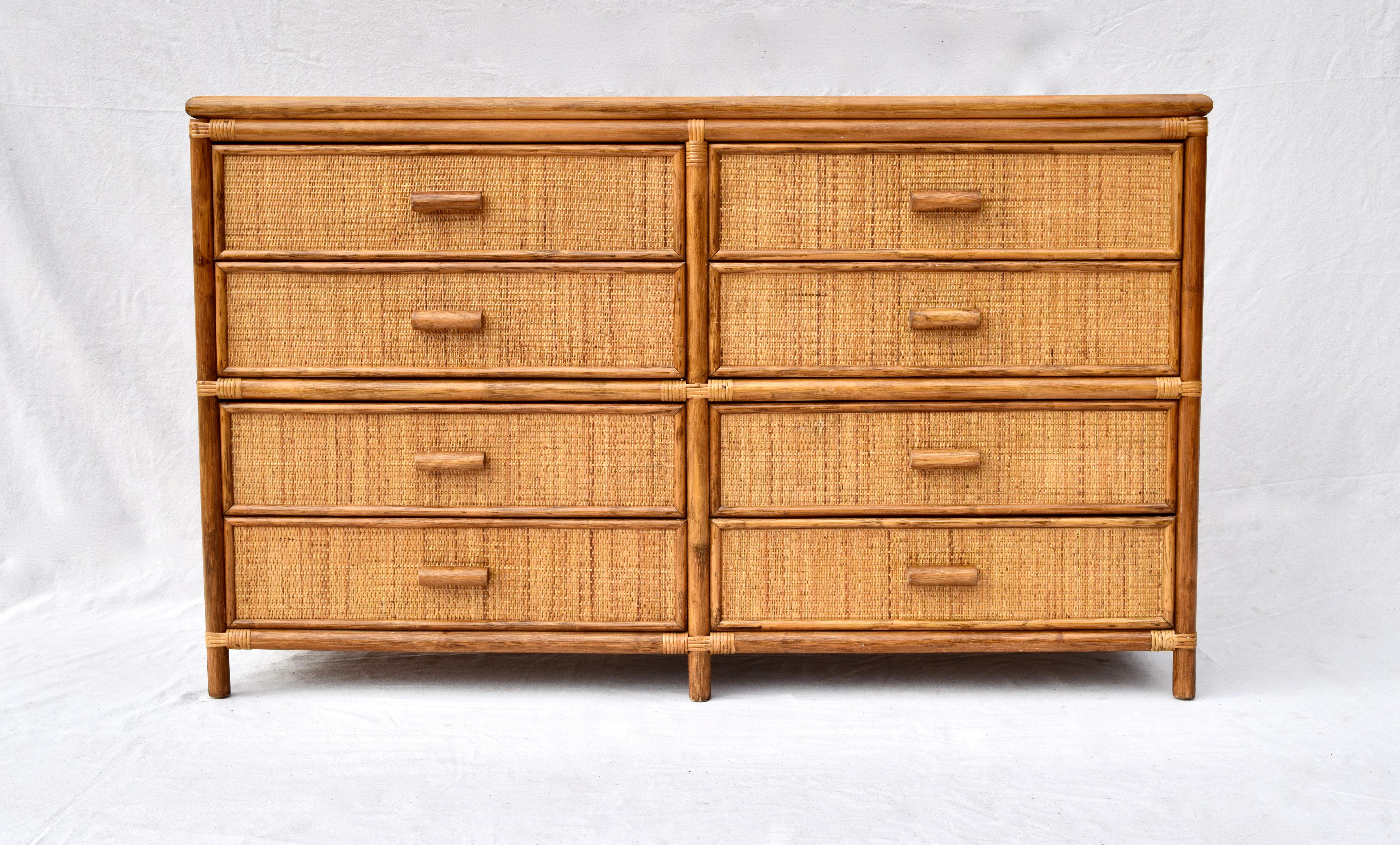 A credenza style chest of eight generous sized dovetailed drawers attributed to the Bielecky Brothers of New York 1960s. Solid wood construction cane wrapped throughout.