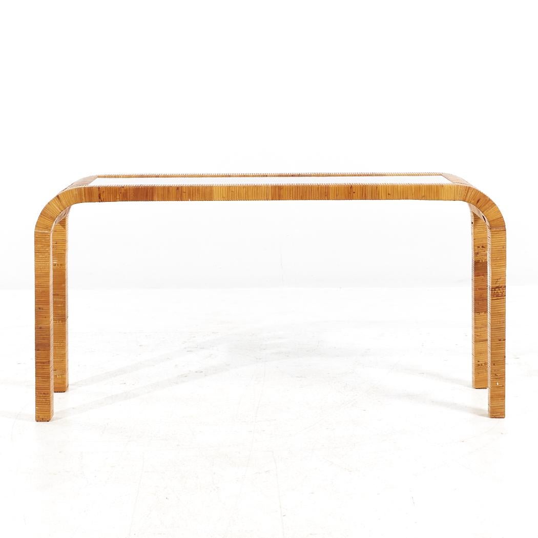 Bielecky Brothers Mid Century Rattan Foyer Entry Console Sofa Table

This console table measures: 55.75 wide x 16 deep x 27.75 inches high

All pieces of furniture can be had in what we call restored vintage condition. That means the piece is