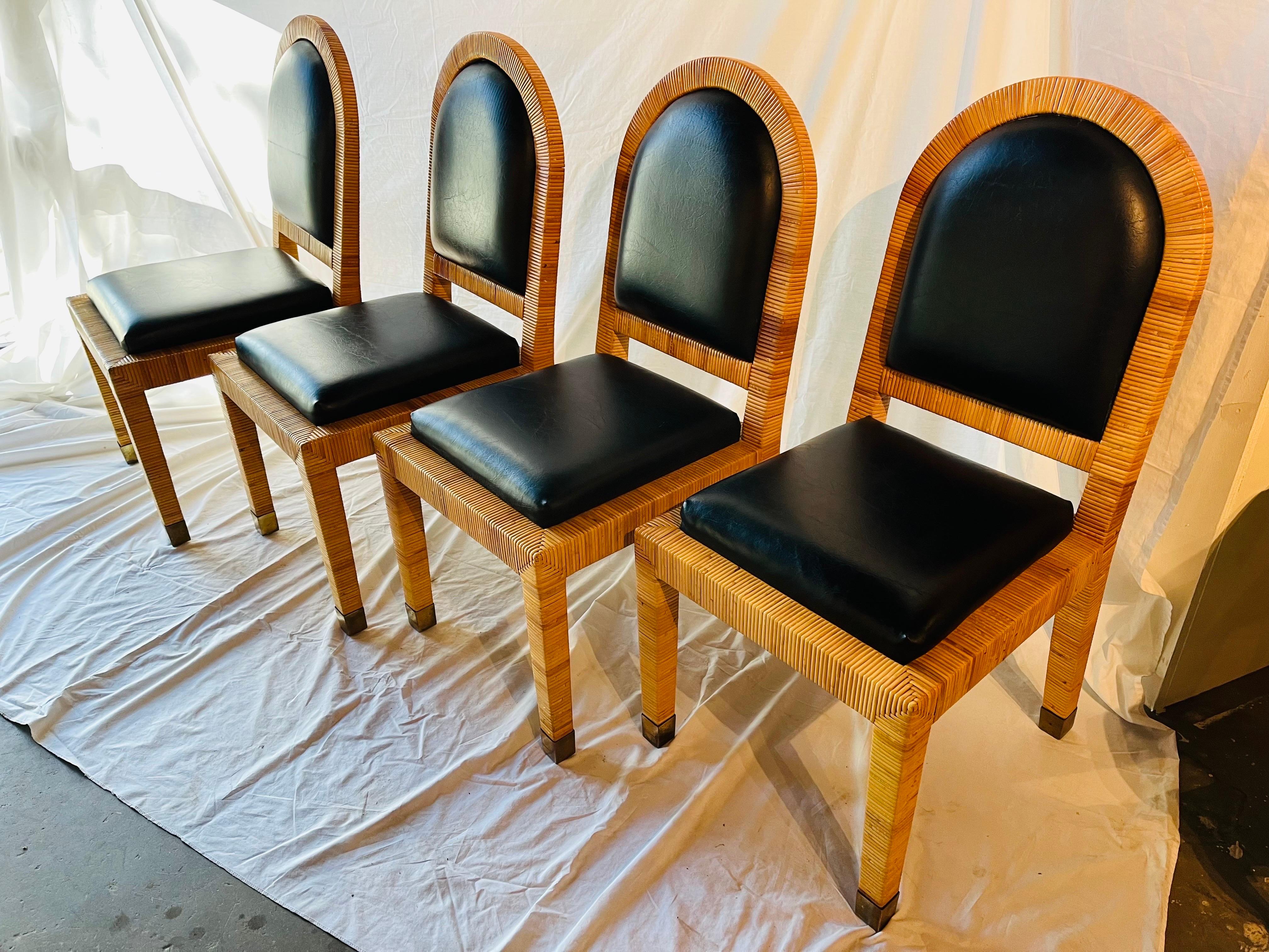A vintage marked and documented set of four Bielecky Brothers wrapped rattan and upholstery dining chairs. Bielecky Brothers has a long history in the United States, starting in 1903 when the Bielecky Brothers emigrated from Poland to Queens, New