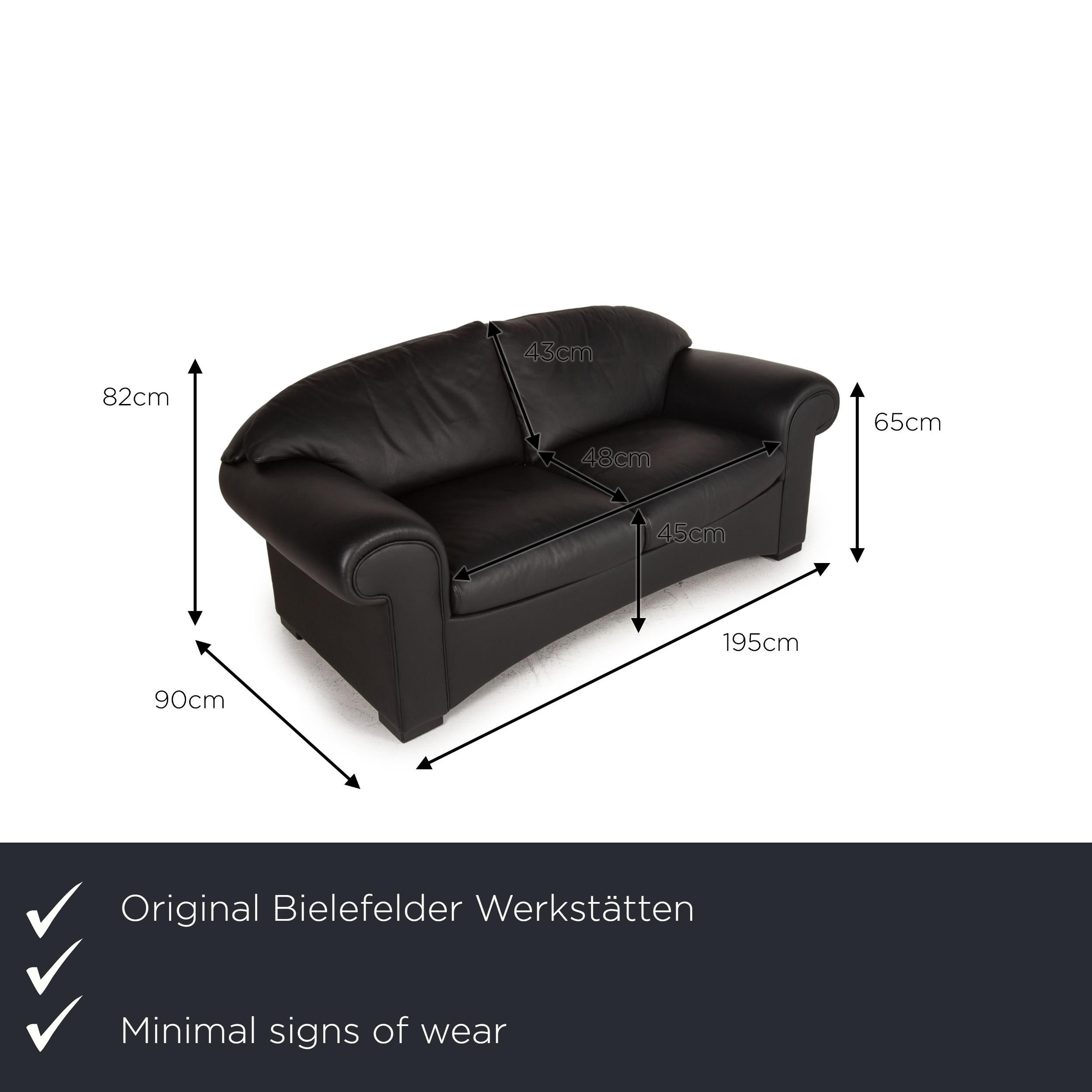 We present to you a Bielefelder Werkstätten leather sofa black two-seater couch.
  
 

 Product measurements in centimeters:
 

 depth: 90
 width: 195
 height: 82
 seat height: 45
 rest height: 65
 seat depth: 48
 seat width: 130
 back