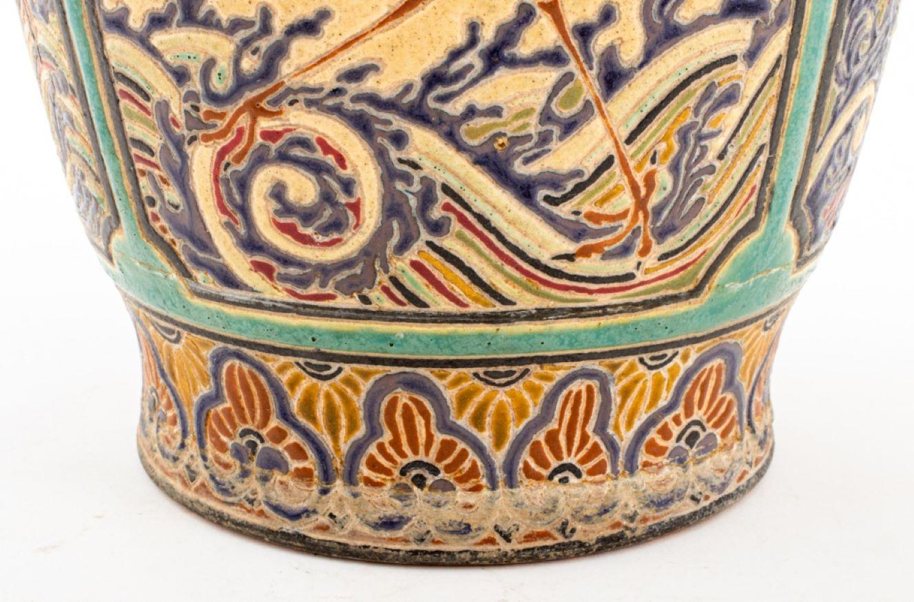 Bien Hoa Vietnamese Ceramic Vase, polychrome glazed and incised with images of mythical creatures amongst clouds and waves comprising a qilin, dragon, turtle, and phoenix, marked to underside. 14.25