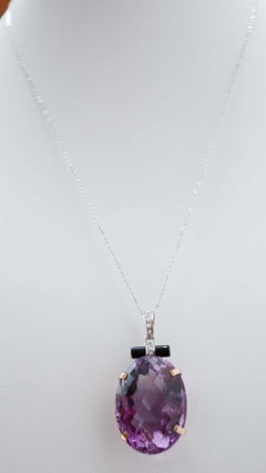 Big amethyst, Onyx, Diamonds, Platinum, 14 Kt Rose Gold and  White Gold Pendant.