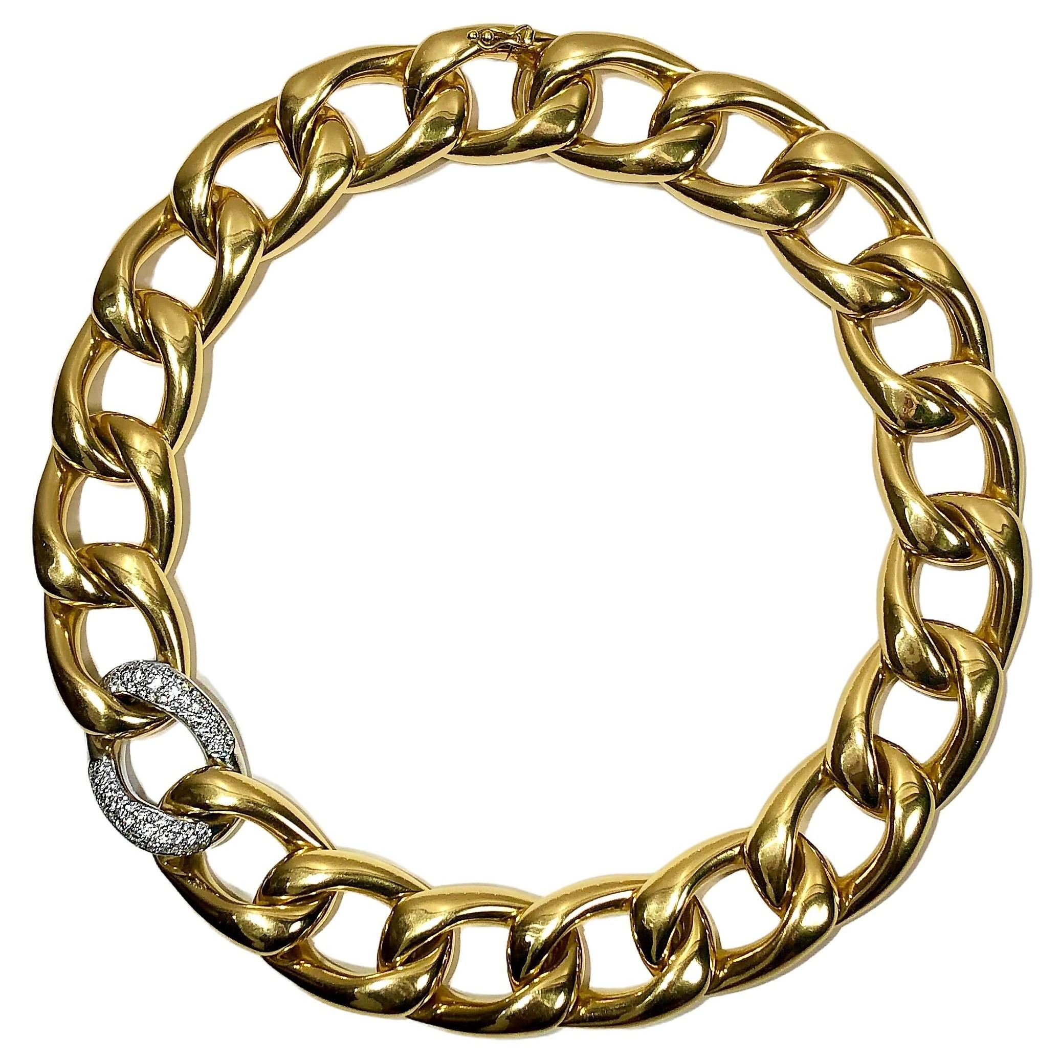 This finely crafted 18k yellow gold modified curb link necklace was created and released by venerated German maker, Abel & Zimmerman. It measures 16 inches in length and a very substantial 13/16 inches in width. The high quality and attention to
