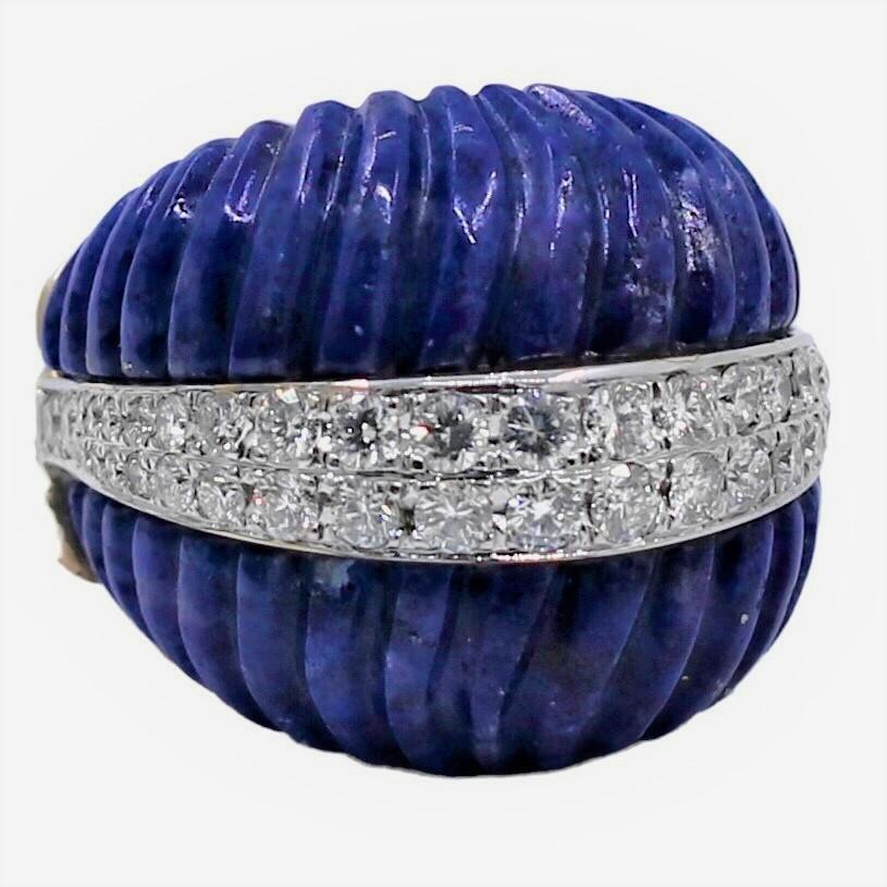This striking Late-20th century bombe dome  cocktail ring is crafted from 14K yellow gold, fluted Lapis Lazuli, and brilliant cut diamonds. The design area of this impressive, statement ring measures a full 1 inch wide by 7/8 inches long, and rises
