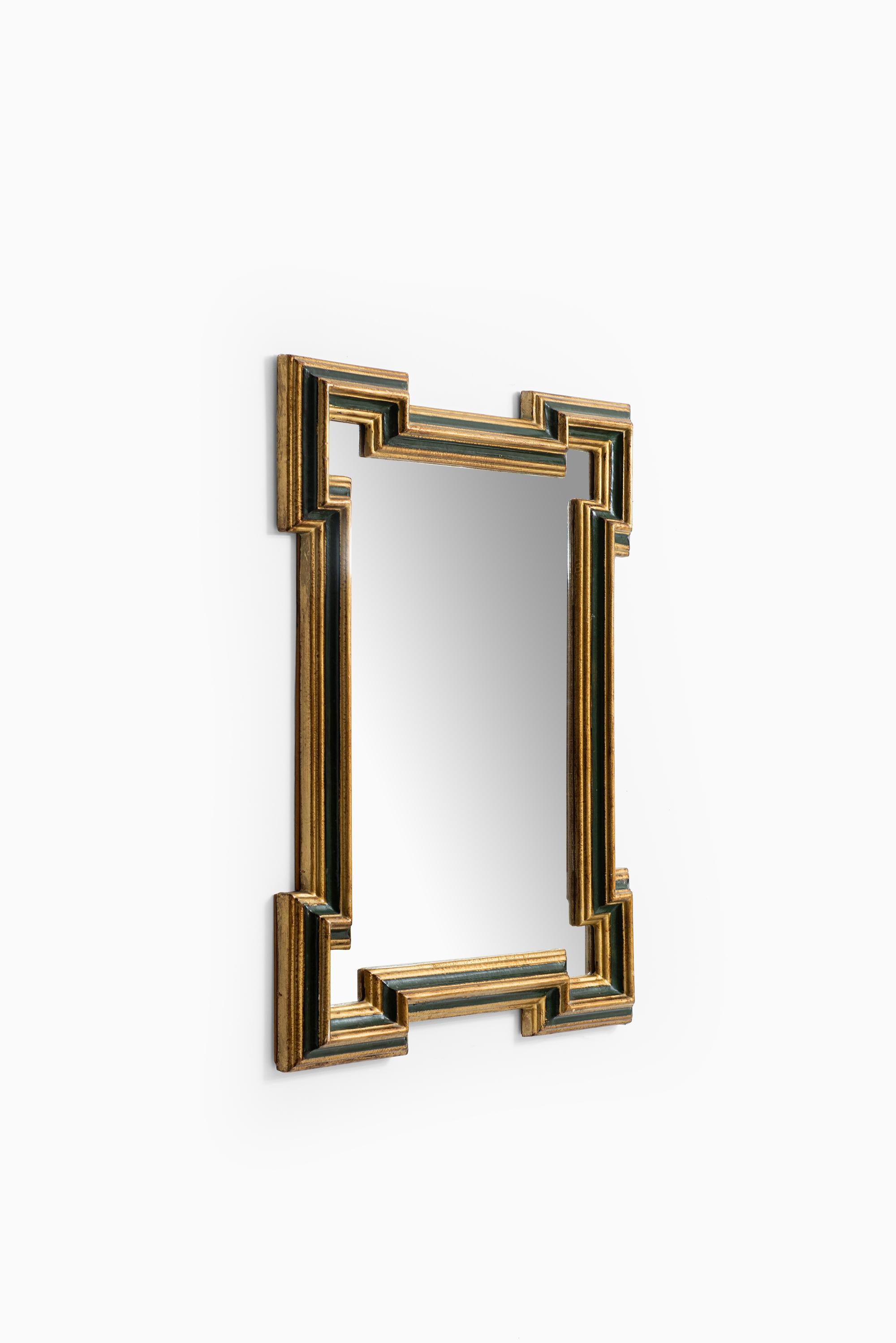Big and decorative mirror by unknown designer. Produced in Sweden.