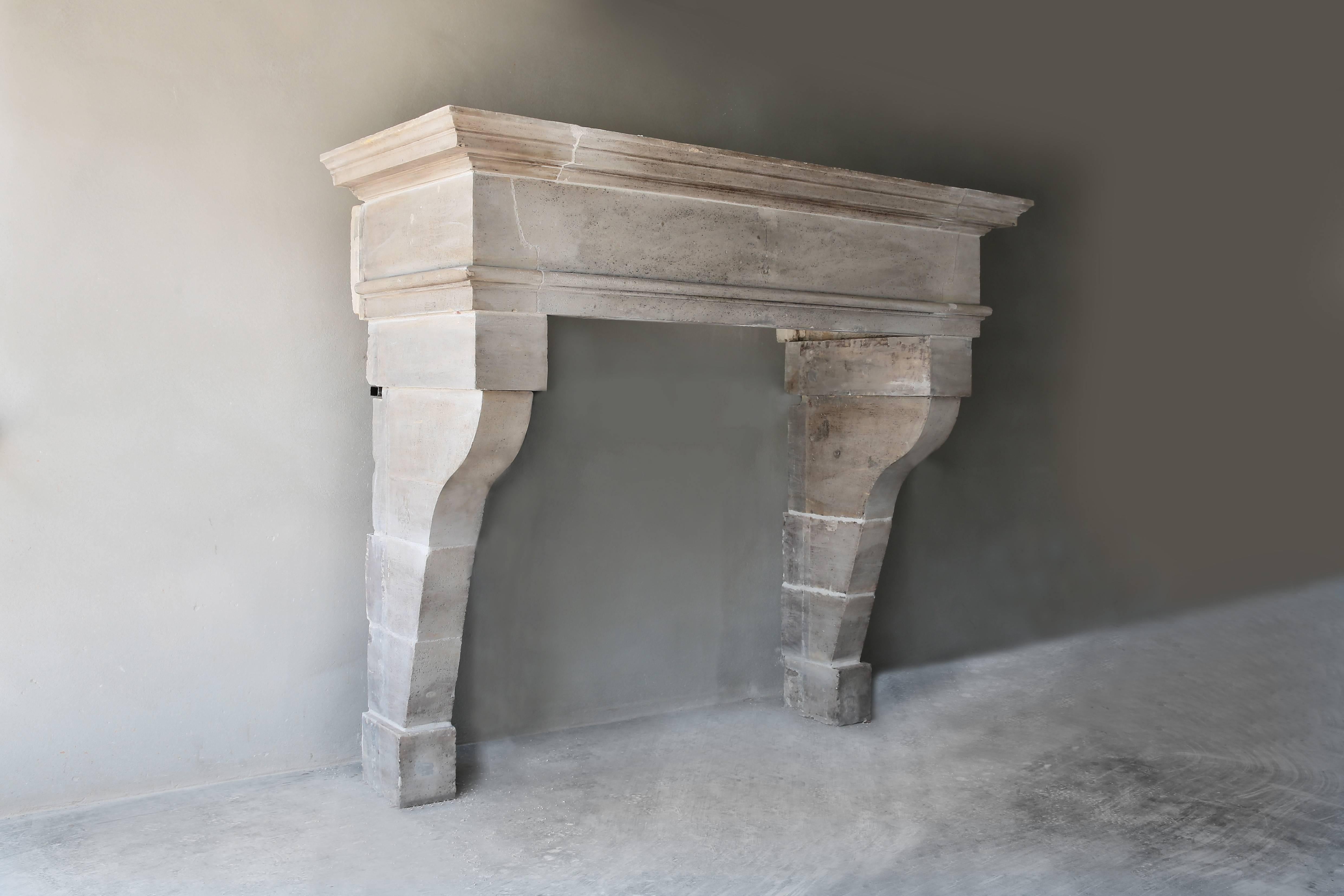 Recently we have found this beautiful robust and sturdy castle fireplace from the middle of France. This Louis XIII fireplace features a view through the wide front section and beautiful molding. The proportions of this antique fireplace are exactly