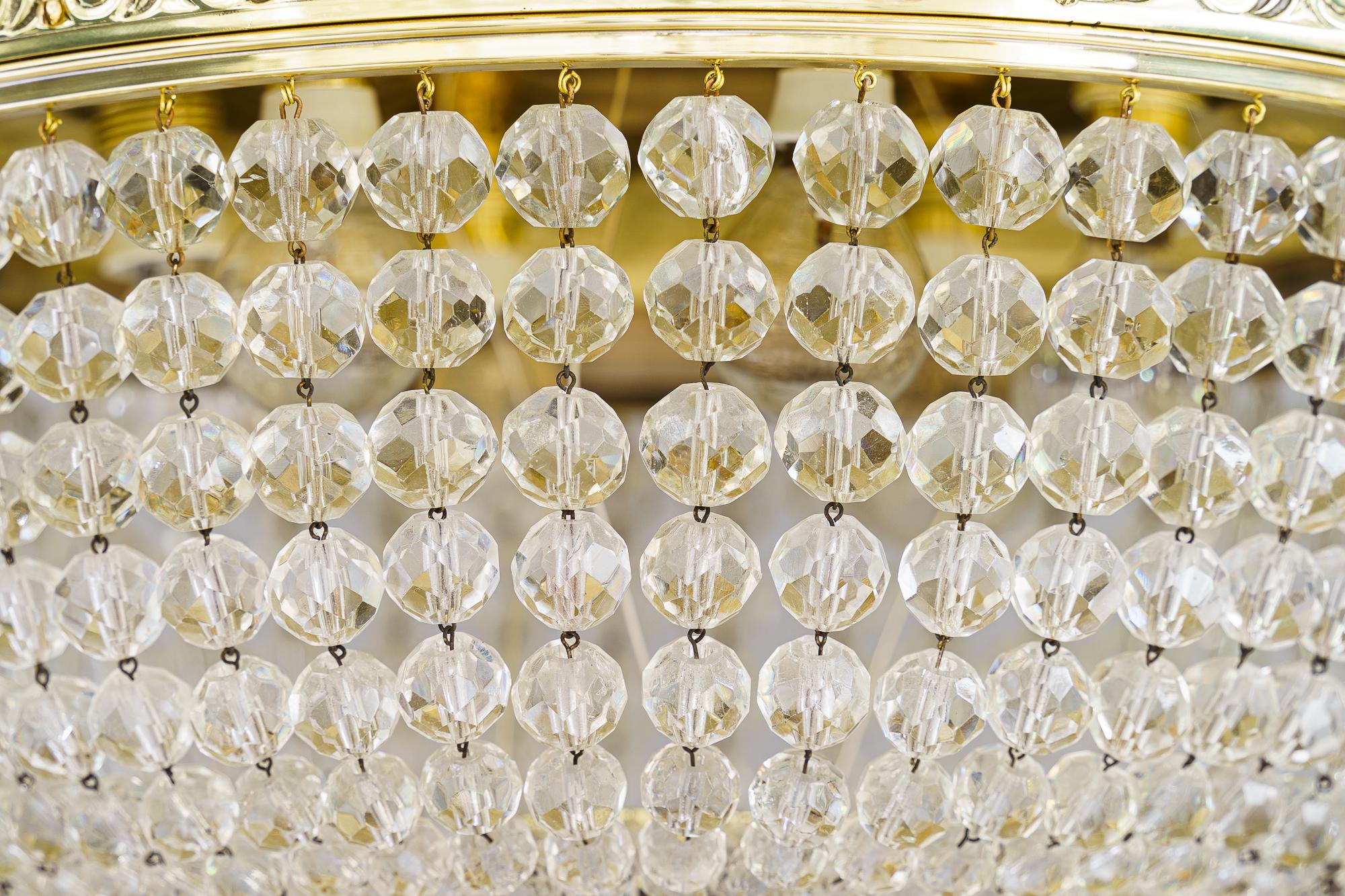 Bigli Art Deco Deckenlampe Wien 1920er Jahre mit geschliffenen Glaskugeln
Messing poliert und emailliert
