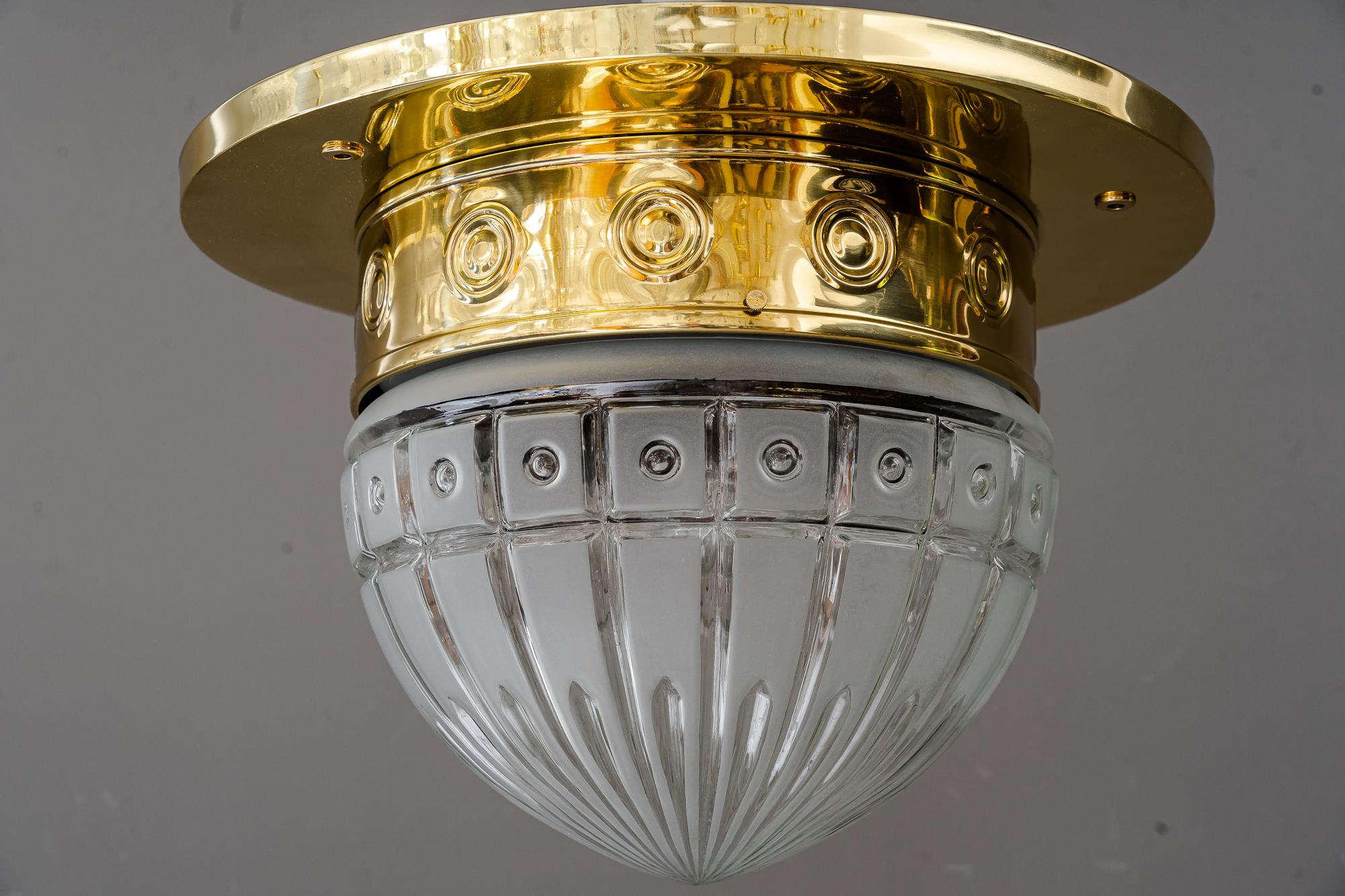Big Art Deco ceiling lamp vienna around 1920s.
Brass polished and stove enameled.