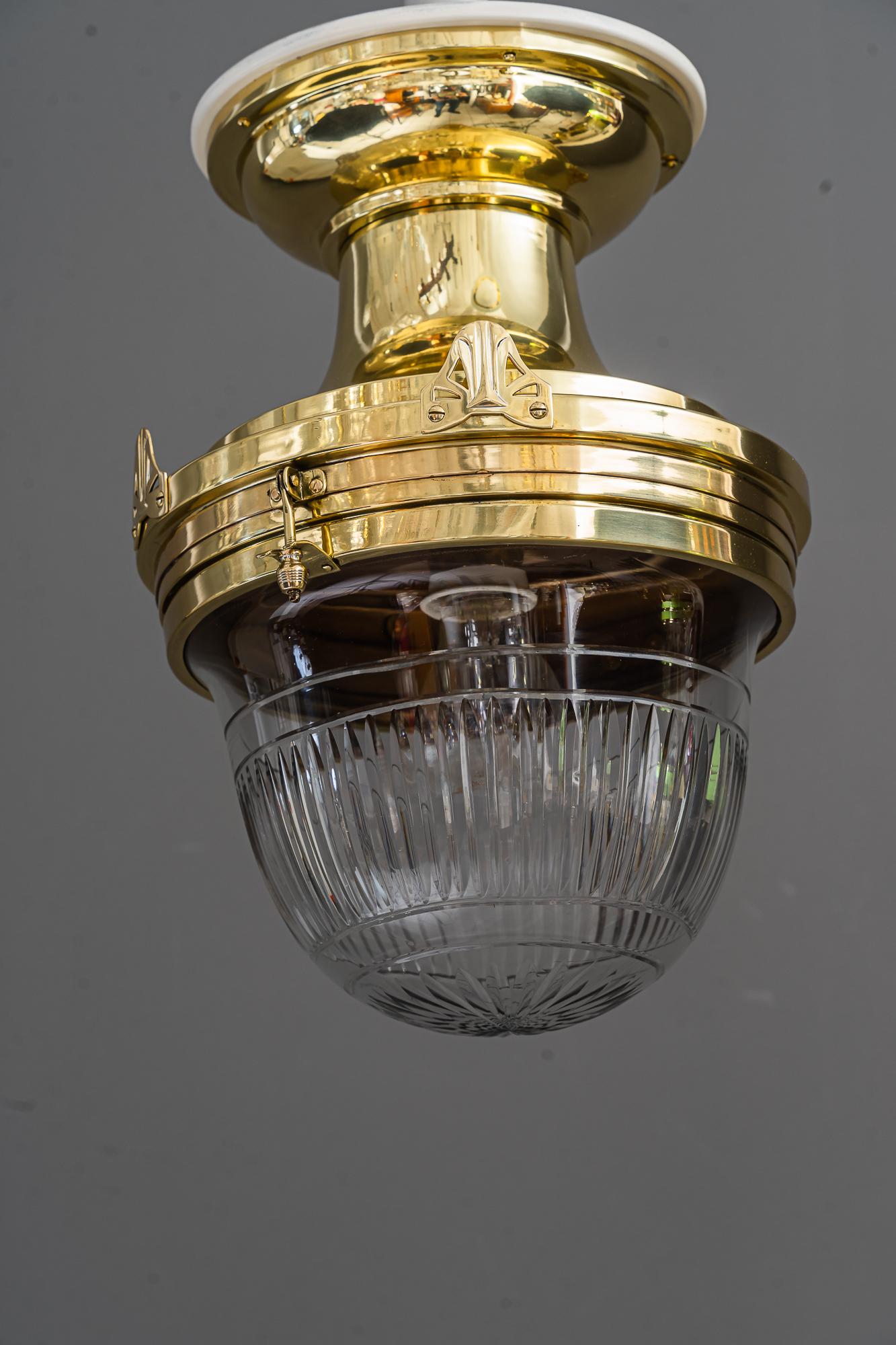 Big art deco ceiling lamp with cut glass vienna around 1920s
Polished and stove enamelled
Wood white paited on top.