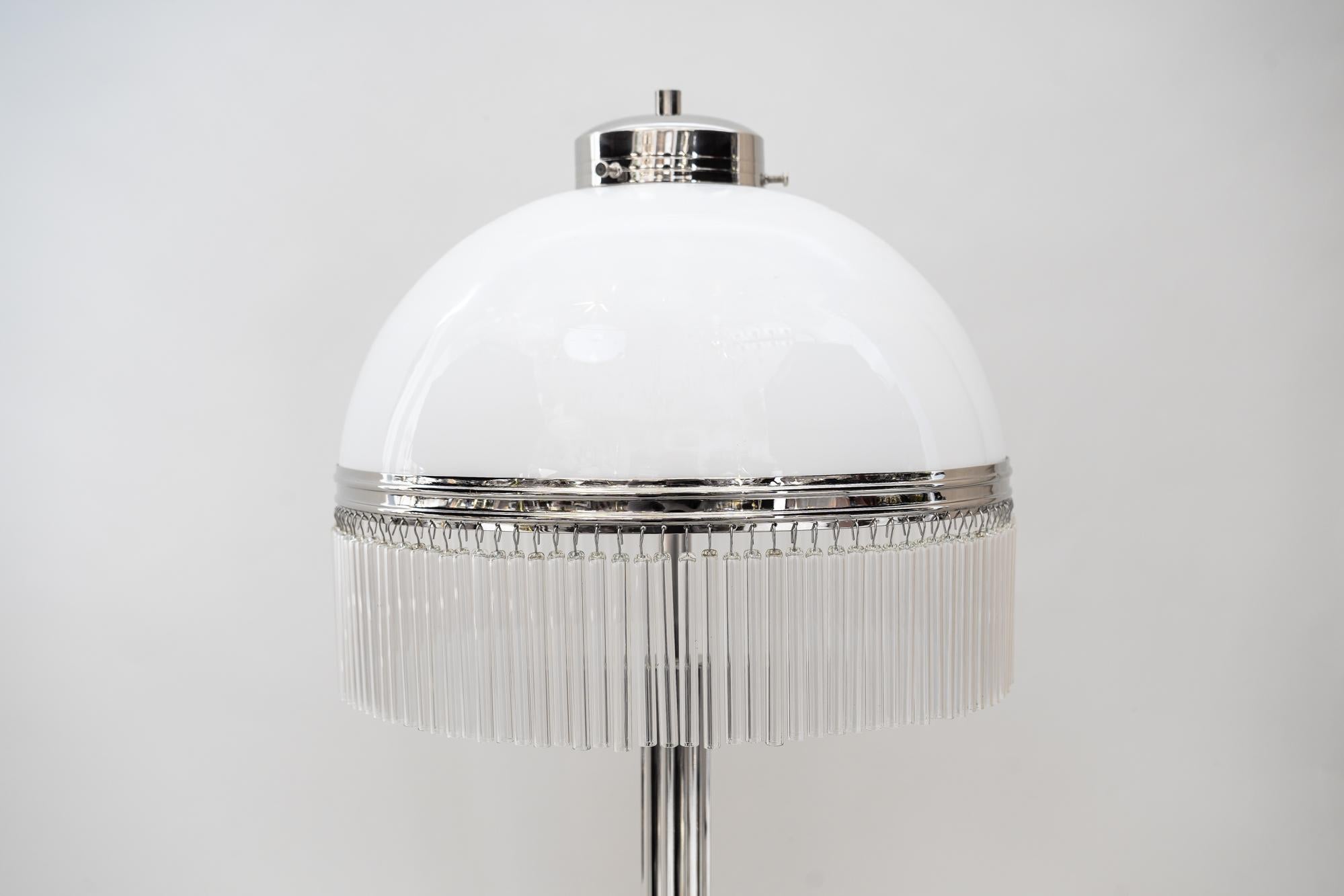 Big Art Deco table lamp nickel-plated with original satined opal glas, 1920s
Nickel-plated
Glass sticks are replaced (new).