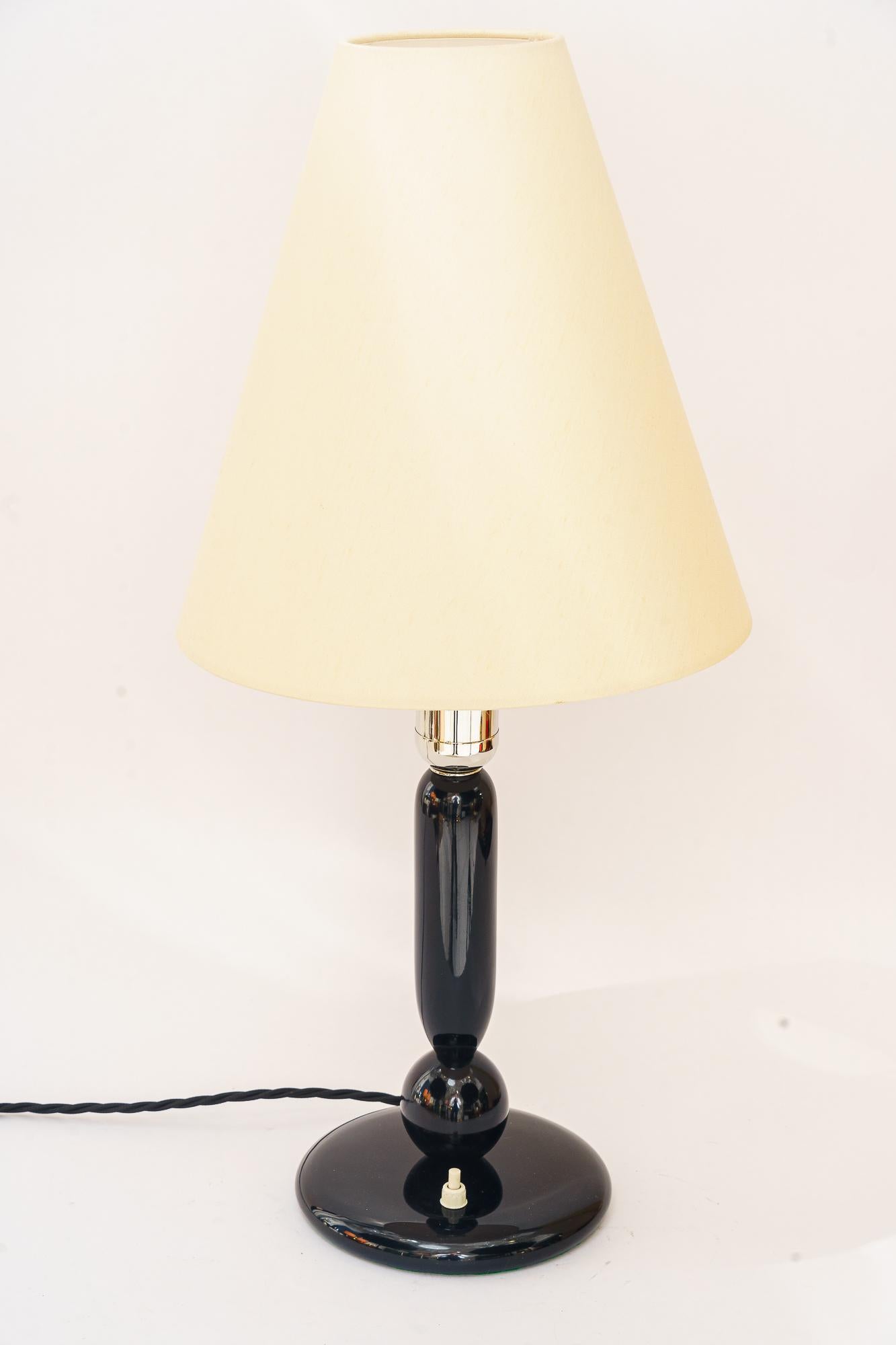 Big art deco wood table lamp with fabric shade vienna around 1930s
Partly nickel plated
Wood polished
The shade is replaced ( new )