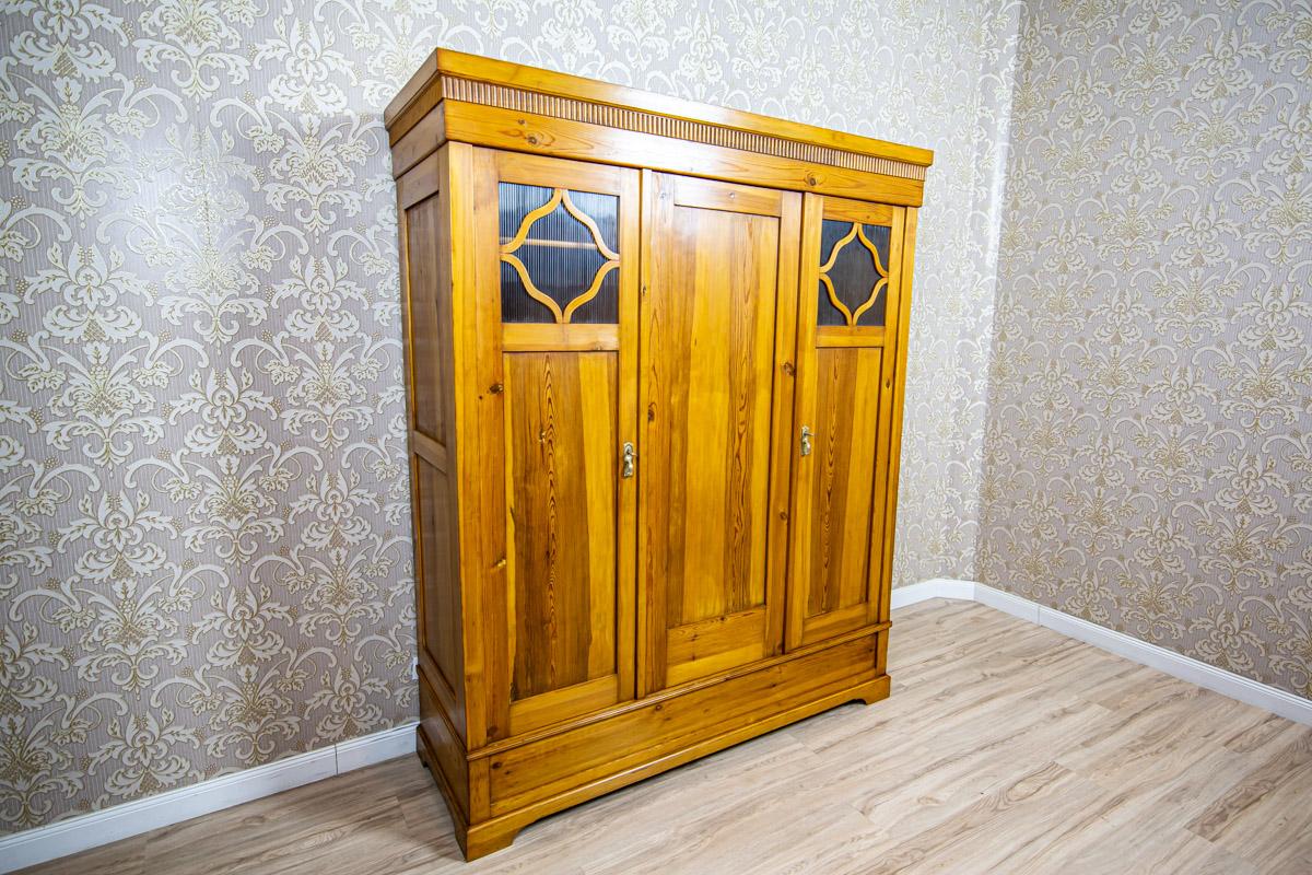 Massive Art Nouveau Pine Wardrobe, circa 1910

We present you a three-leaf pine wardrobe, circa 1910, in the Art Nouveau style.
This piece of furniture is of a simple form, finished with a cornice with ornamentation.
The upper section of the doors