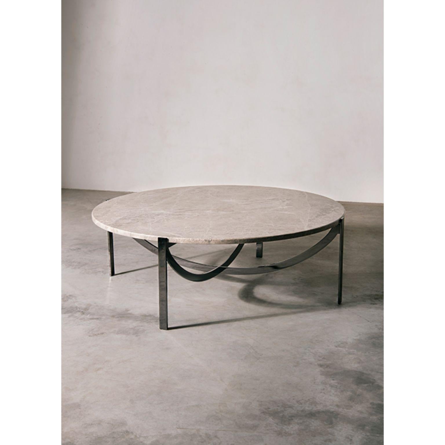 Big Astra coffee table by Patrick Norguet
Materials: Marble, metal structure
Dimensions: Ø 101.6 x H 33.8 cm

The Astra family of coffee tables surprises by its sophisticated simplicity.
It was named as a tribute to those old instruments, which