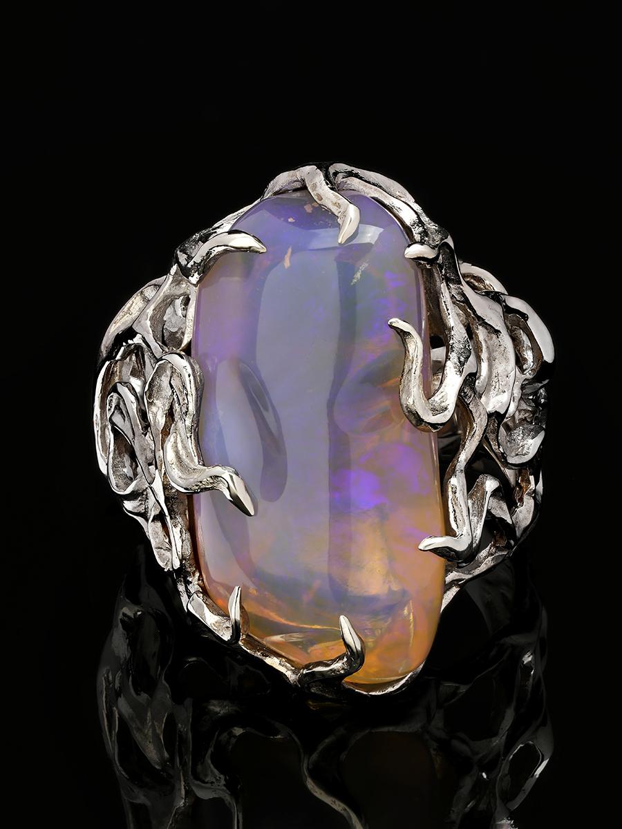 Silver ring with natural freeform Neon Opal 
opal origin - Australia
opal measurements - 0.39 x 0.51 x 0.98 in / 10 х 13 х 25 mm
opal weight - 20.10 carats
ring size - 7.5 US
ring weight - 13.72 grams

Waves collection


We ship our jewelry
