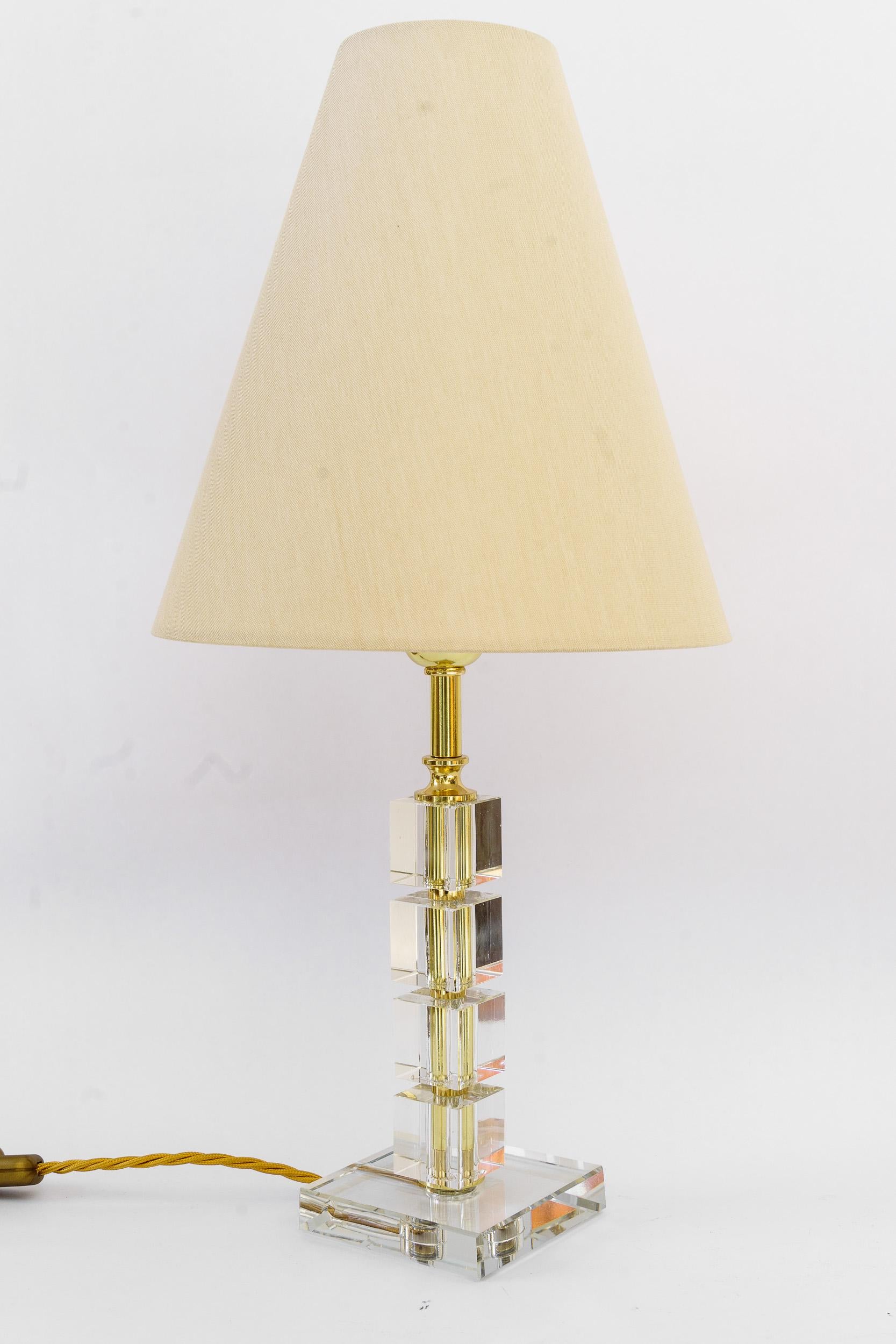 Große Bakalowits Glastischlampe mit Stoffschirm Wien um 1920er Jahre
Messing poliert und emailliert