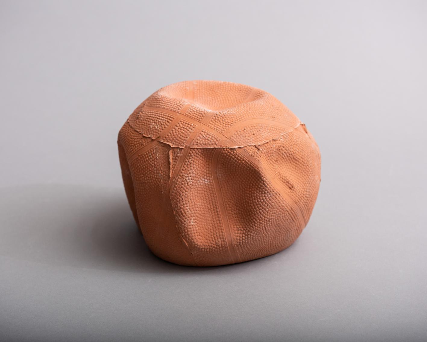 Big Balls big bowls – A deflated basket-ball first kicked along the streets of Vancouver after late night beers and sushi with friends. 

Cast in small batches in terracotta, retaining its crumpled lines and mimicking its original color, this is a