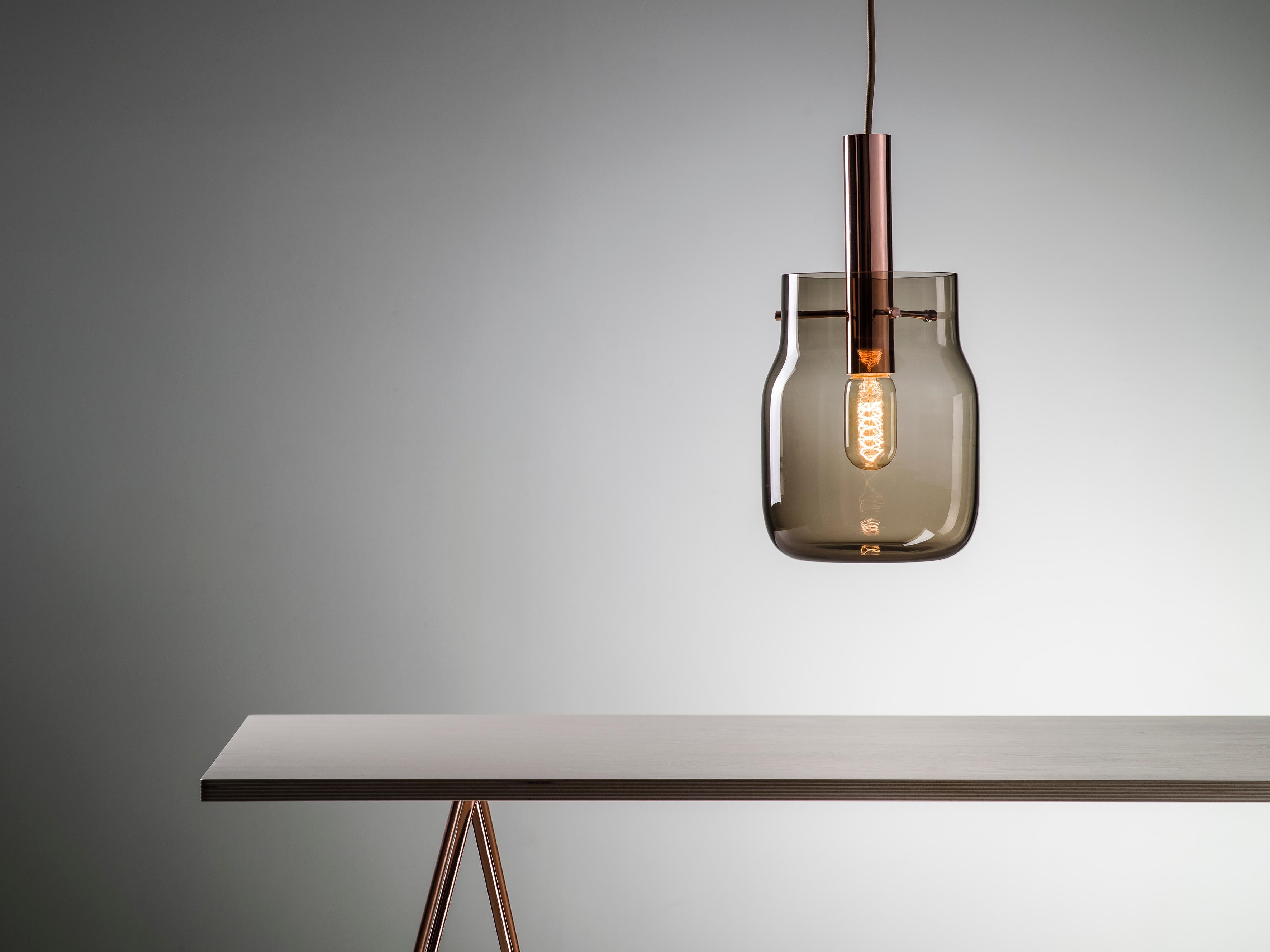 Big Bandaska Pendant Light by Dechem Studio
Dimensions: D 18 x H 180 cm
Materials: Brass, Glass.
Also Available: Different colours and sizes available,

Hand-blown into beech wood moulds, Bandaska Lights is based on the highly popular Bandaska