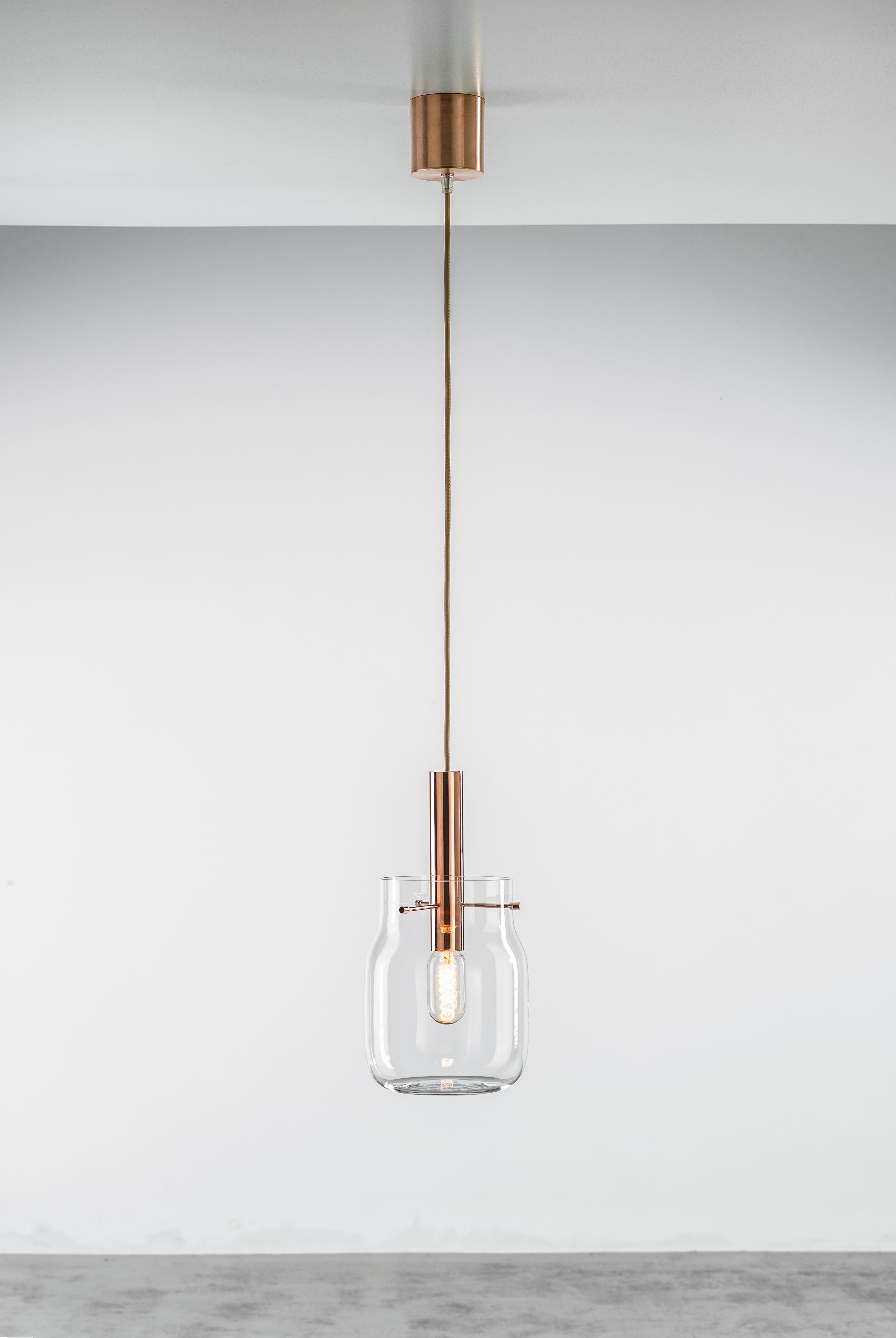 Big Bandaska pendant light by Dechem Studio
Dimensions: D 18 x H 180 cm
Materials: brass, glass.
Also available: different colours and sizes available.

hand blown into beechwood moulds, Bandaska Lights is based on the highly popular Bandaska