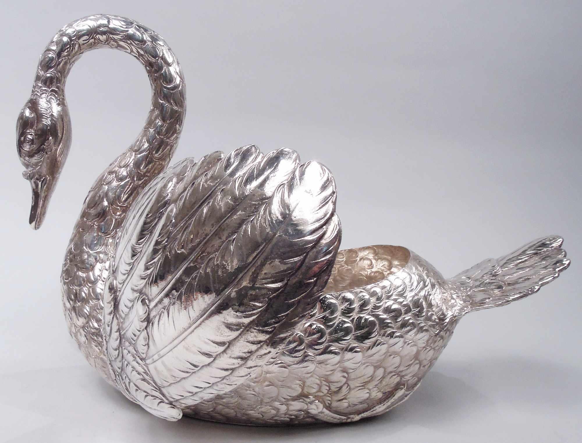German 800 silver figural bird bowl, ca 1910. A big beautiful swan with graceful downturned neck terminating in closed and tapering bill. Fan-shaped tail and hinged wings ready to spread for taking flight if the party chat gets too dull. Finely