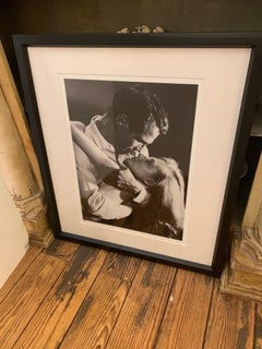 Big Black and White Photograph of Iconic Movie Stars Embracing