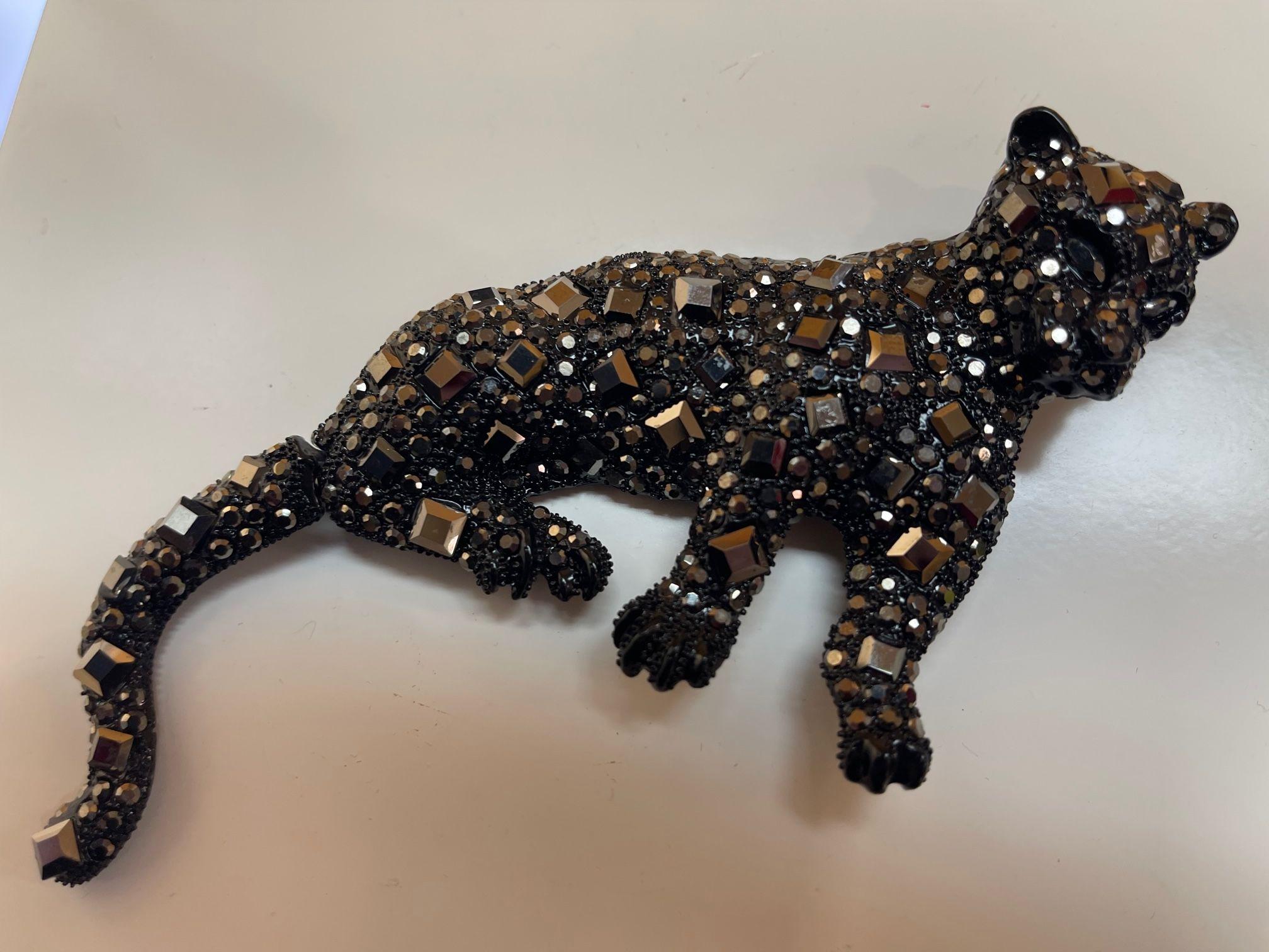 Simply Fabulous! Vintage Designer Big Black Cheetah Cat with articulated tail Brooch Pendant. Embellished with Sparkling Black Diamond and Round shaped faux Crystals. Dynamic in all Sparkling Black! Approx. 5