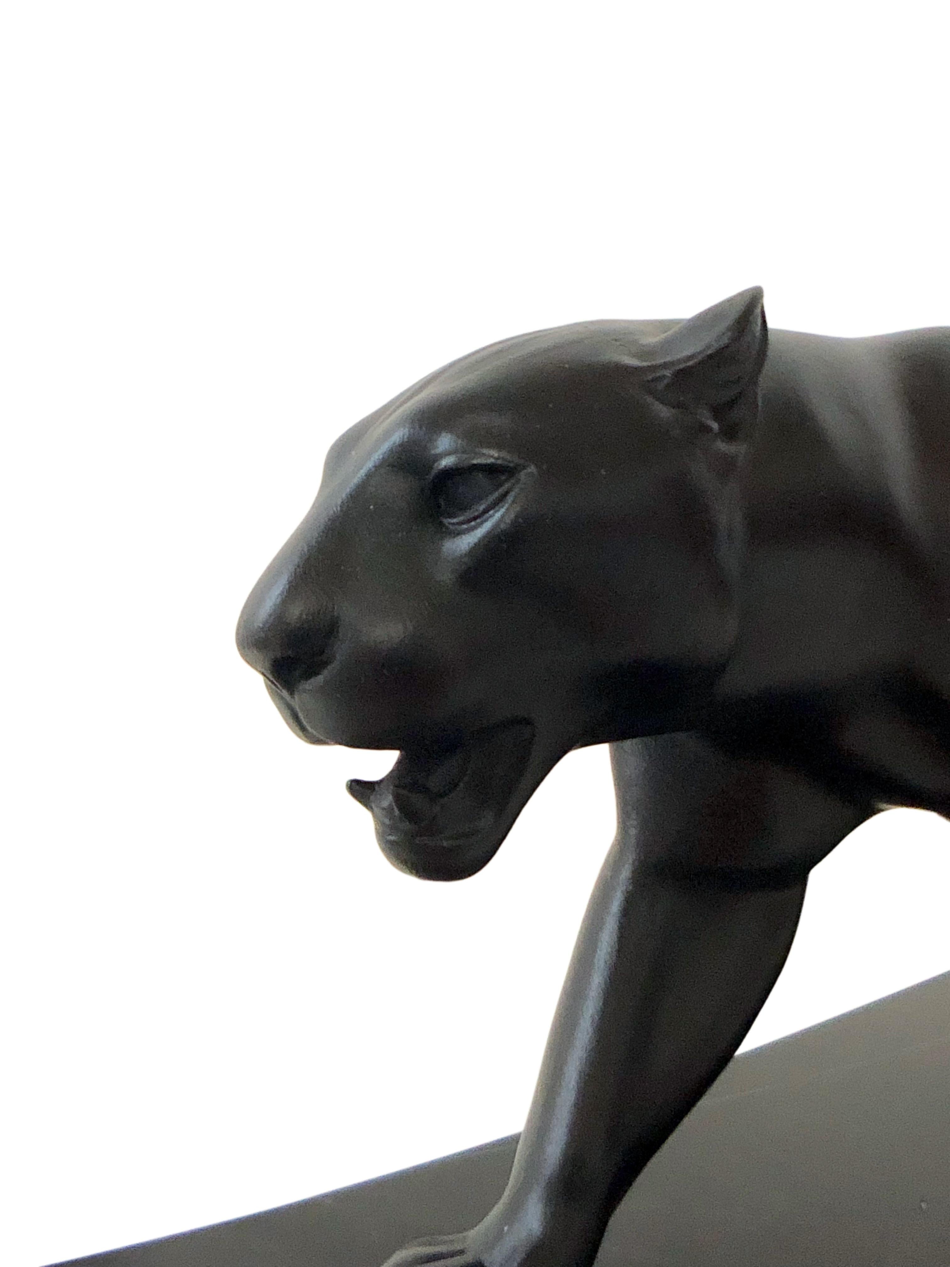 Big Lion / panther sculpture named “Baghera”
Original “Max Le Verrier”, signed
Designed in France during the roaring 1920s by “Max Le Verrier” (1891-1973)
Art Deco style, France 

Materials: patinated spelter (French: régule), marble base 
Socle