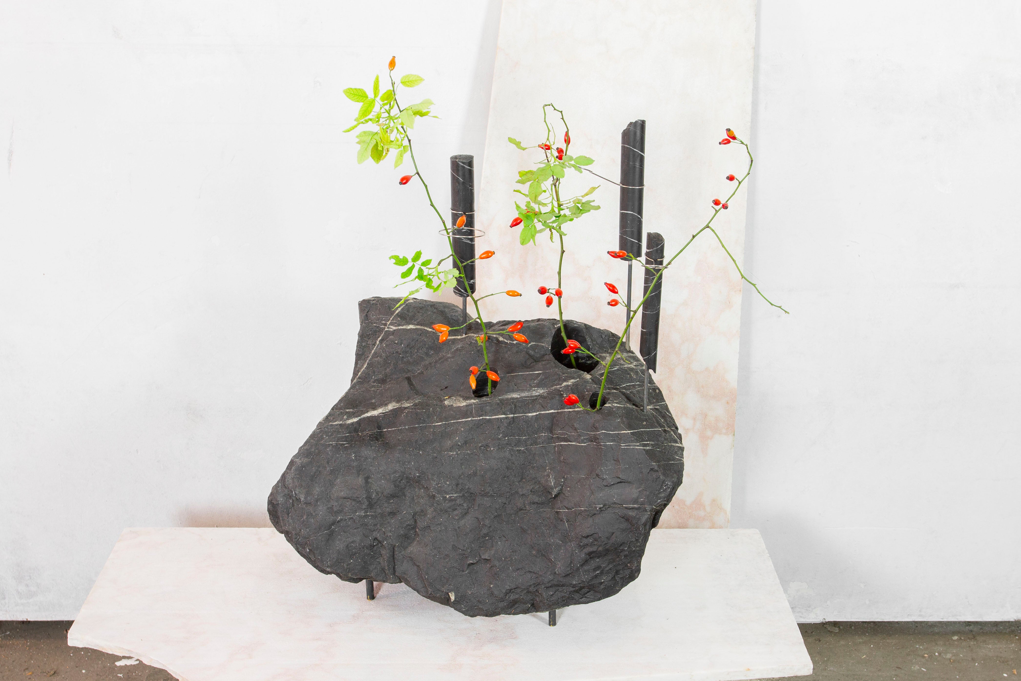 Big Blue Flower Vessel by Studio DO
Dimensions: D 63 x W 31 x H 70 cm
Materials: Stone, steel.

Flowers are intrinsically connected with composition and earth.
Influenced by varied vessels from past to present such as the dutch tulip vase and
