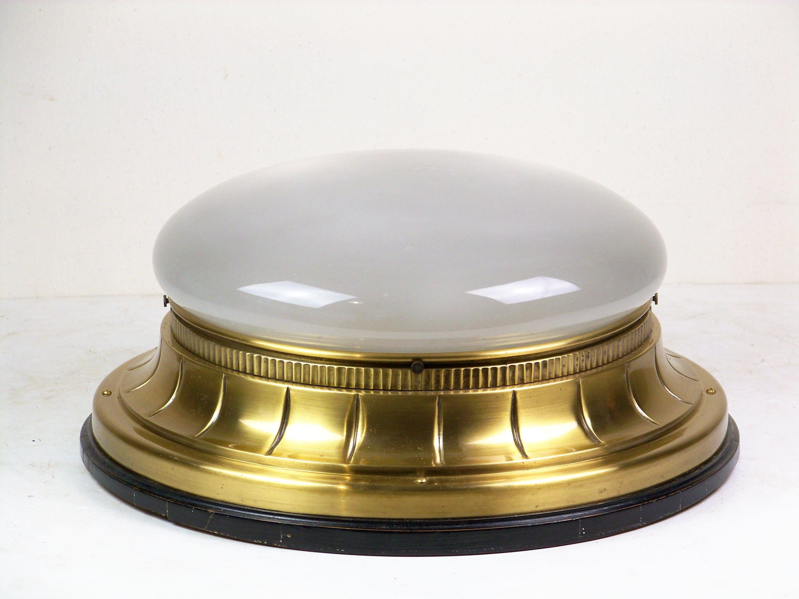 Fully functional in perfect original condition. Renovated surface treatment of the brass body (polished, provided with the appropriate varnish), the wooden part perfectly cleaned and polished. The wooden base was installed in the vault, its shape