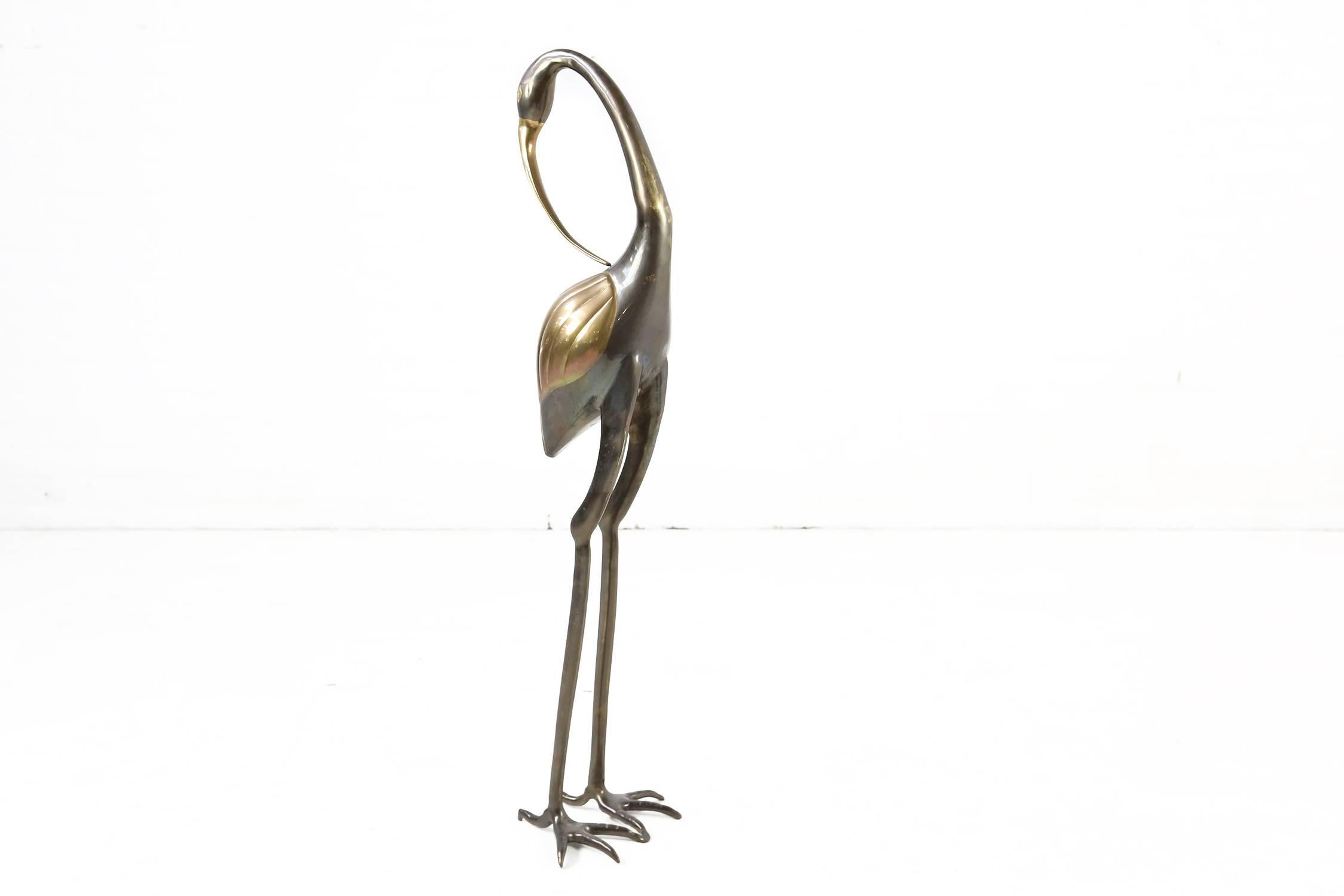 This crane bird sculpture is made of brass and can be dated in the 1970s.
This sculpture will give your interior an exotic touch.
This brass bird is in very good condition.
