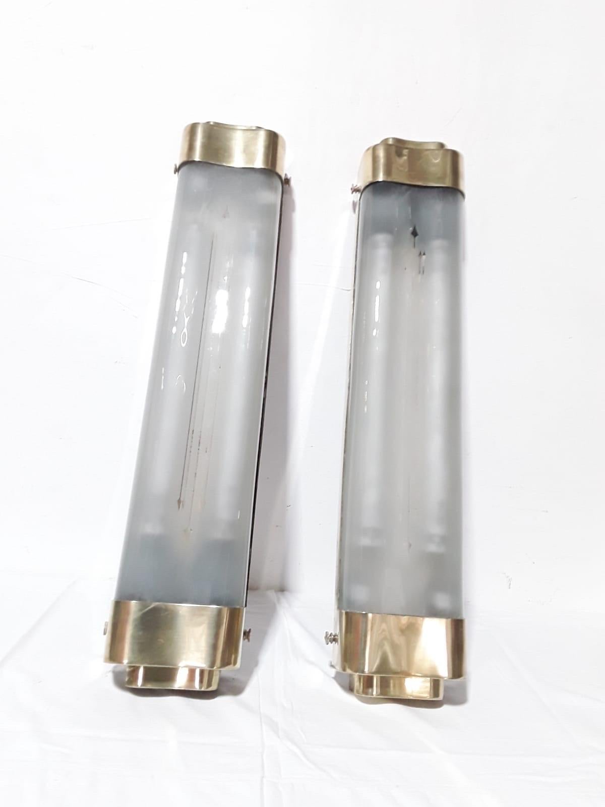 Big brass & glass wall lamps top design 1950s Attr Pietro Chiesa

Very good condition and very nice

Measures 
Cm 85 x cm 20.