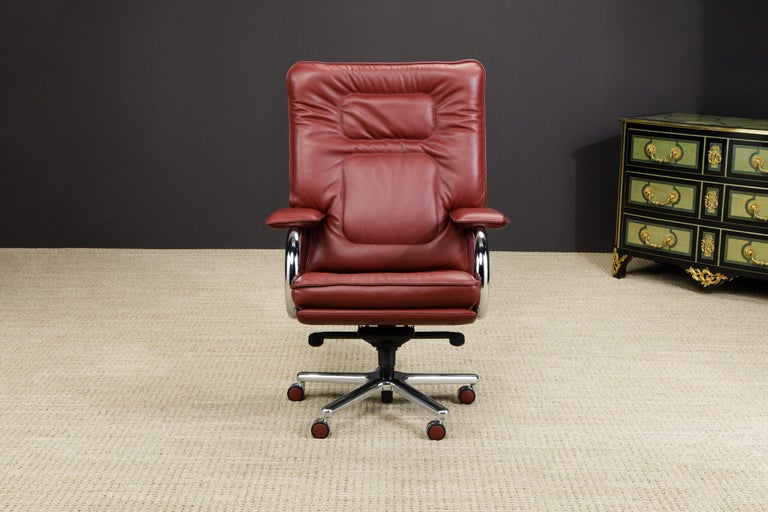 This incredible executives chair is named 'Big', designed by Guido Faleschini by i4 Mariani originally designed in the 1970s, this example newly produced in a gorgeous burgundy red color, the same leather option as used in the hit 1987 film 