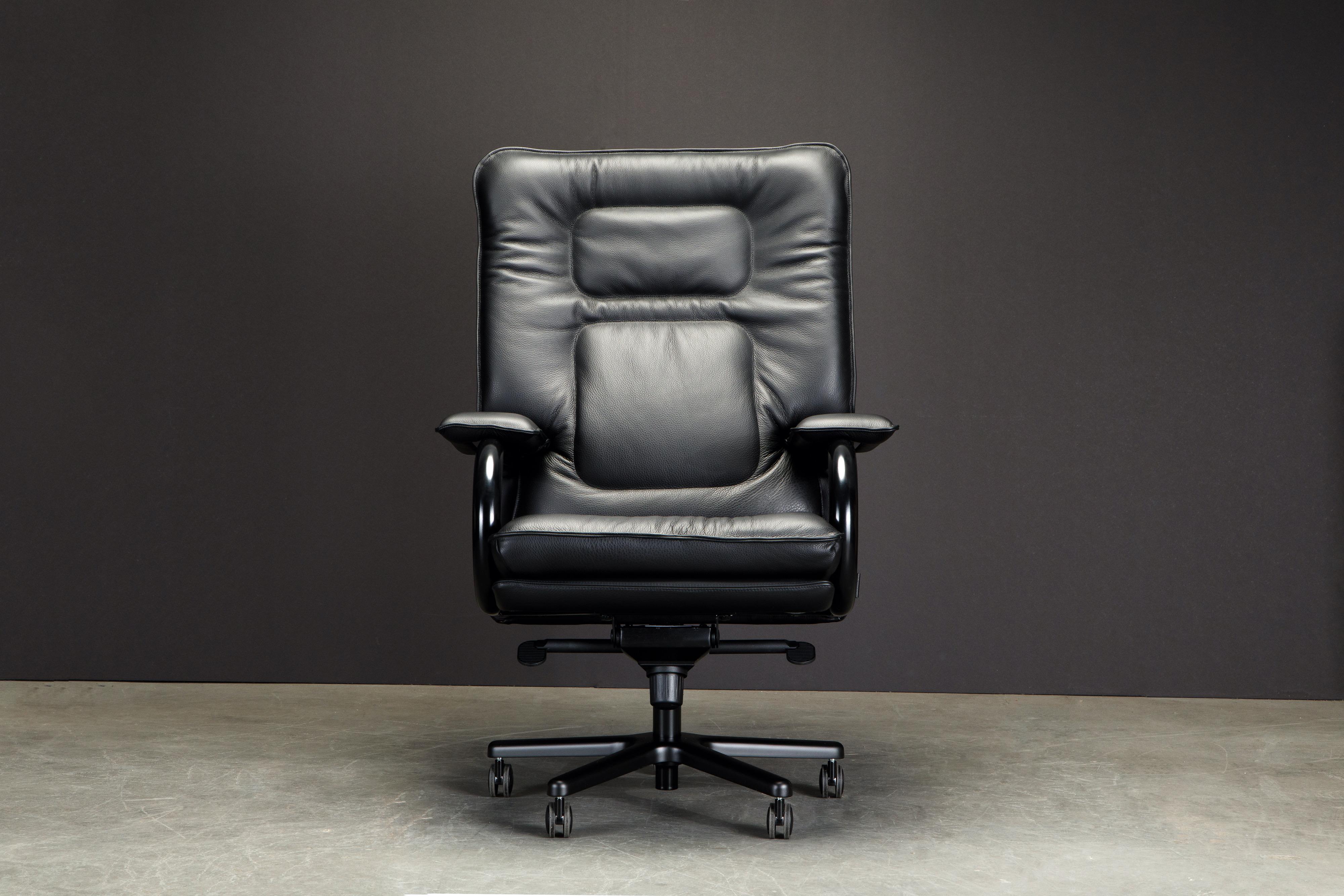 This incredible executives chair is named 'Big', designed by Guido Faleschini by i4 Mariani originally designed in the 1970s, this example newly produced in gorgeous black leather and matching color arms and base. 

Such incredible style, no wonder