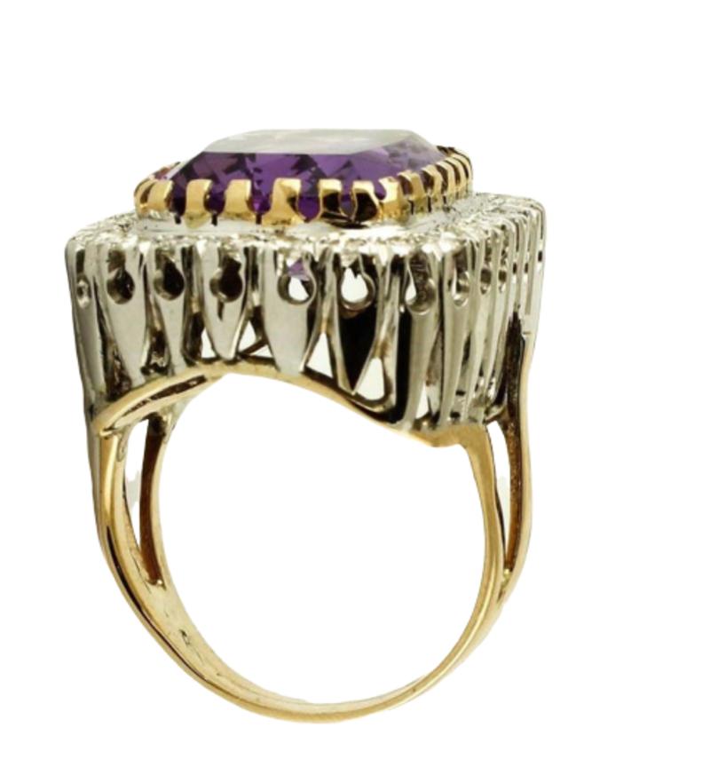 SHIPPING POLICY:
No additional costs will be added to this order.
Shipping costs will be totally covered by the seller (customs duties included). 


Vintage ring in 14k white and yellow gold mounted with a big intense amethyst in the centre