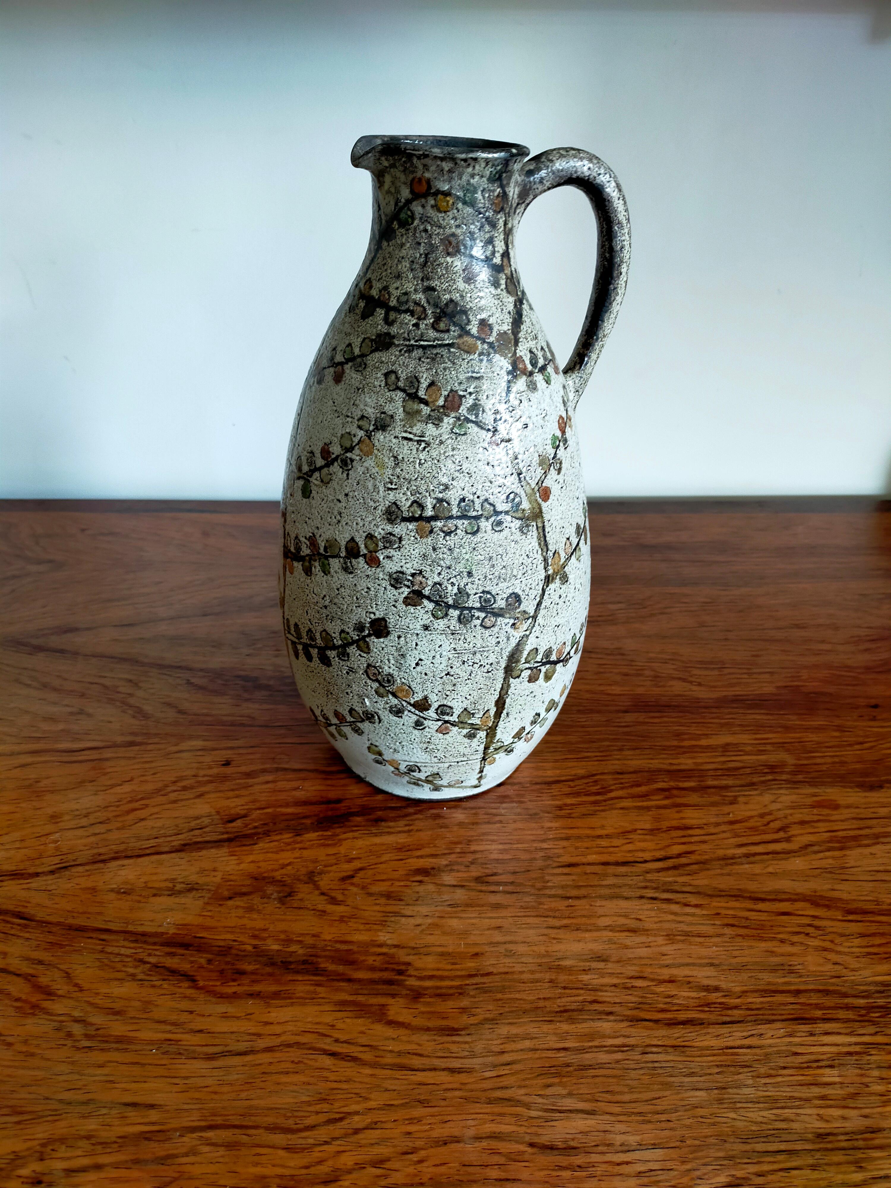 Big ceramic jug or vase by Paul Quéré.
Floral decoration on Beige Gray Engobe.
Signed Le Minotaure at the base.