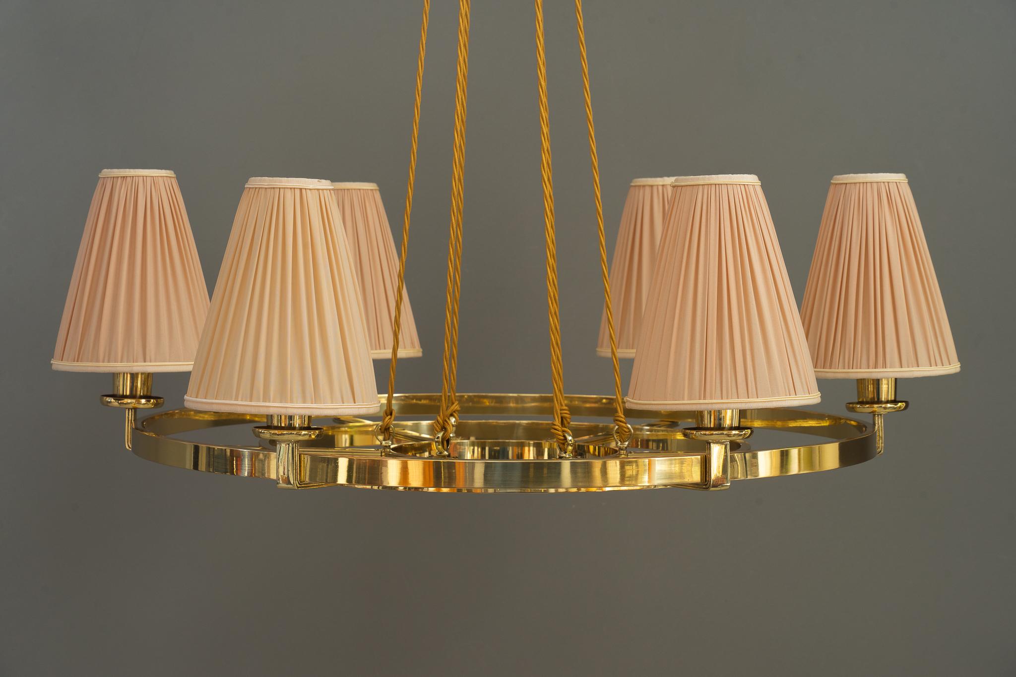 Big Chandelier vienna around 1950s by Rupert Nikoll
Brass polished and stove enameled
The fabric shades are replaced (new).