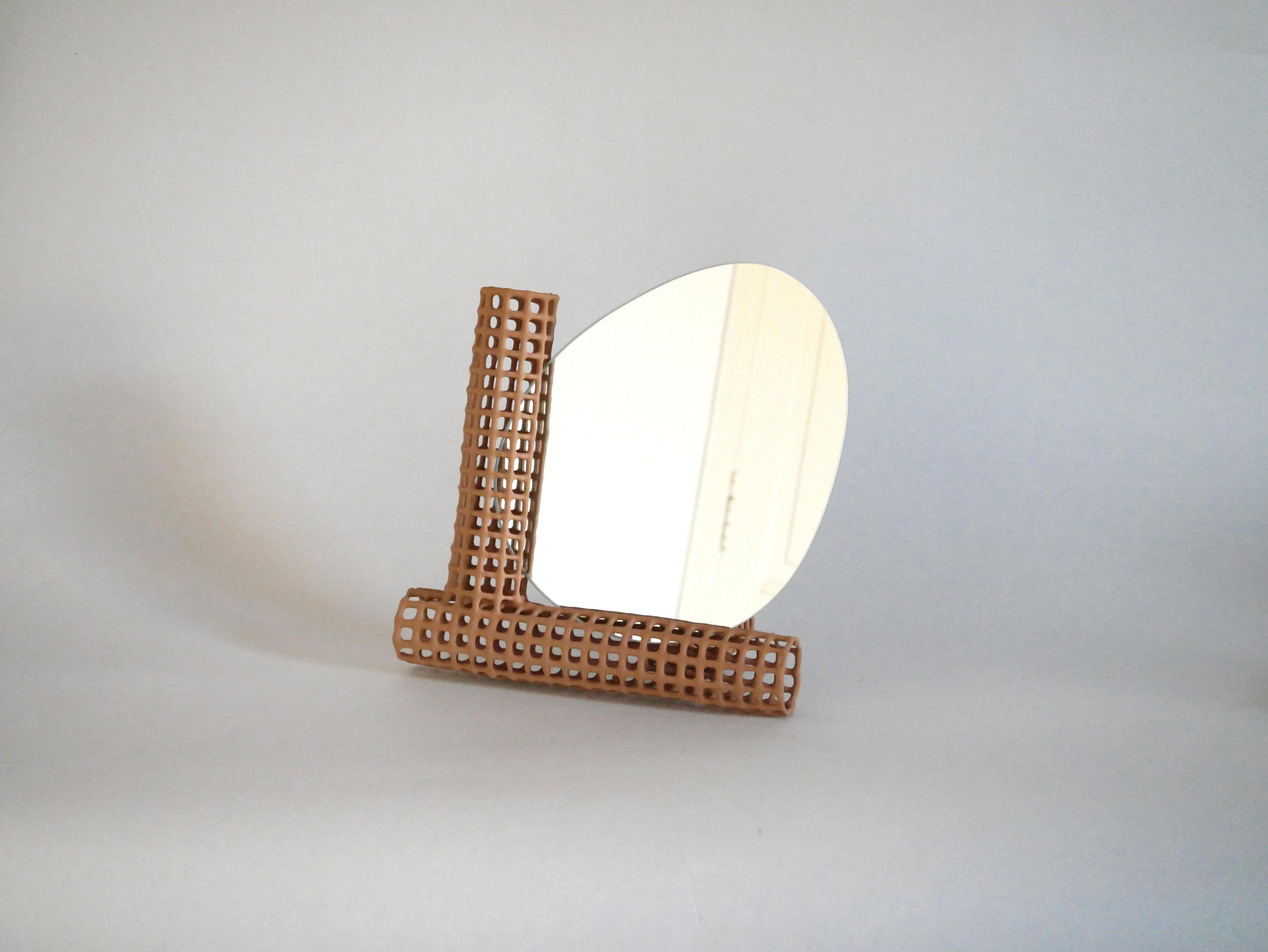Big Chevalet Table Mirror by Dzovag Kotchian
Dimensions: W 29 x D 13 x H 27 cm
Materials: Stabilized Raw Clay, Metal, Mirror. 

Dzovag Kotchian's work develops through theoretical reflection and artistic research. Experimentation with materials,