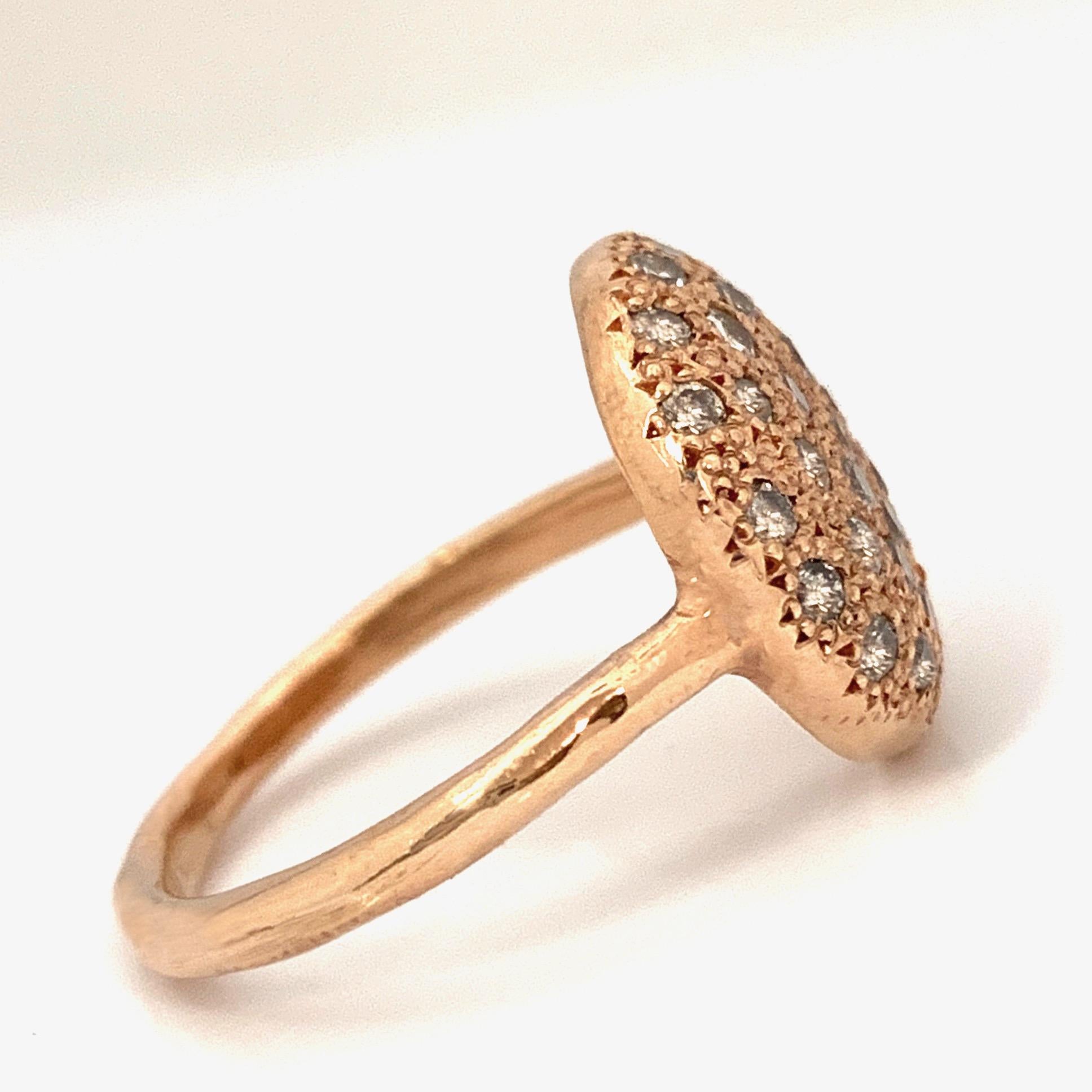 Every cookie is different and delicious, and so are Eytan's Cookie rings!  This one is a gorgeous shade of rose and is faced entirely with tiny beads, which give the gold its distinctive texture and provide the braces for 36 bright white melee