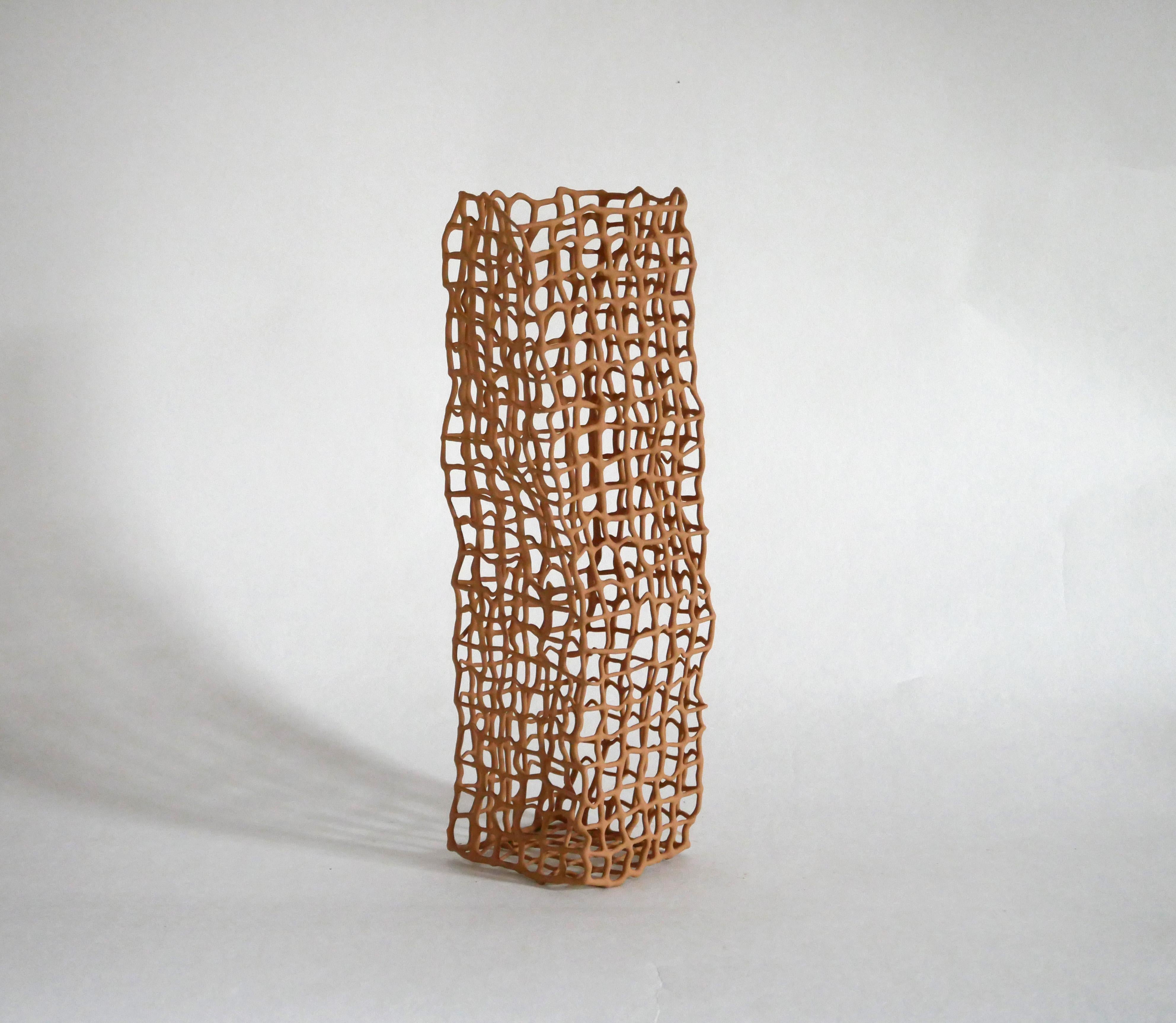 Big Coral Vase by Dzovag Kotchian
Dimensions: W 12 x D 12 x H 40 cm
Materials: Stabilized Raw Clay, Metal. 

Dzovag Kotchian's work develops through theoretical reflection and artistic research. Experimentation with materials, uses and manufacturing