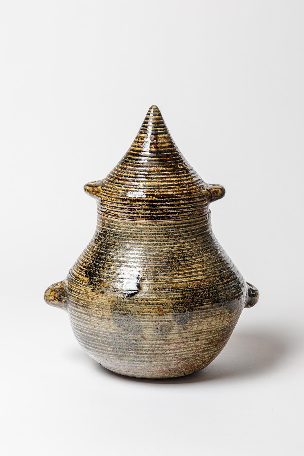 A ceramic covered jar by Jean Lerat to La Borne.
Perfect original conditions.
Signed under the base 