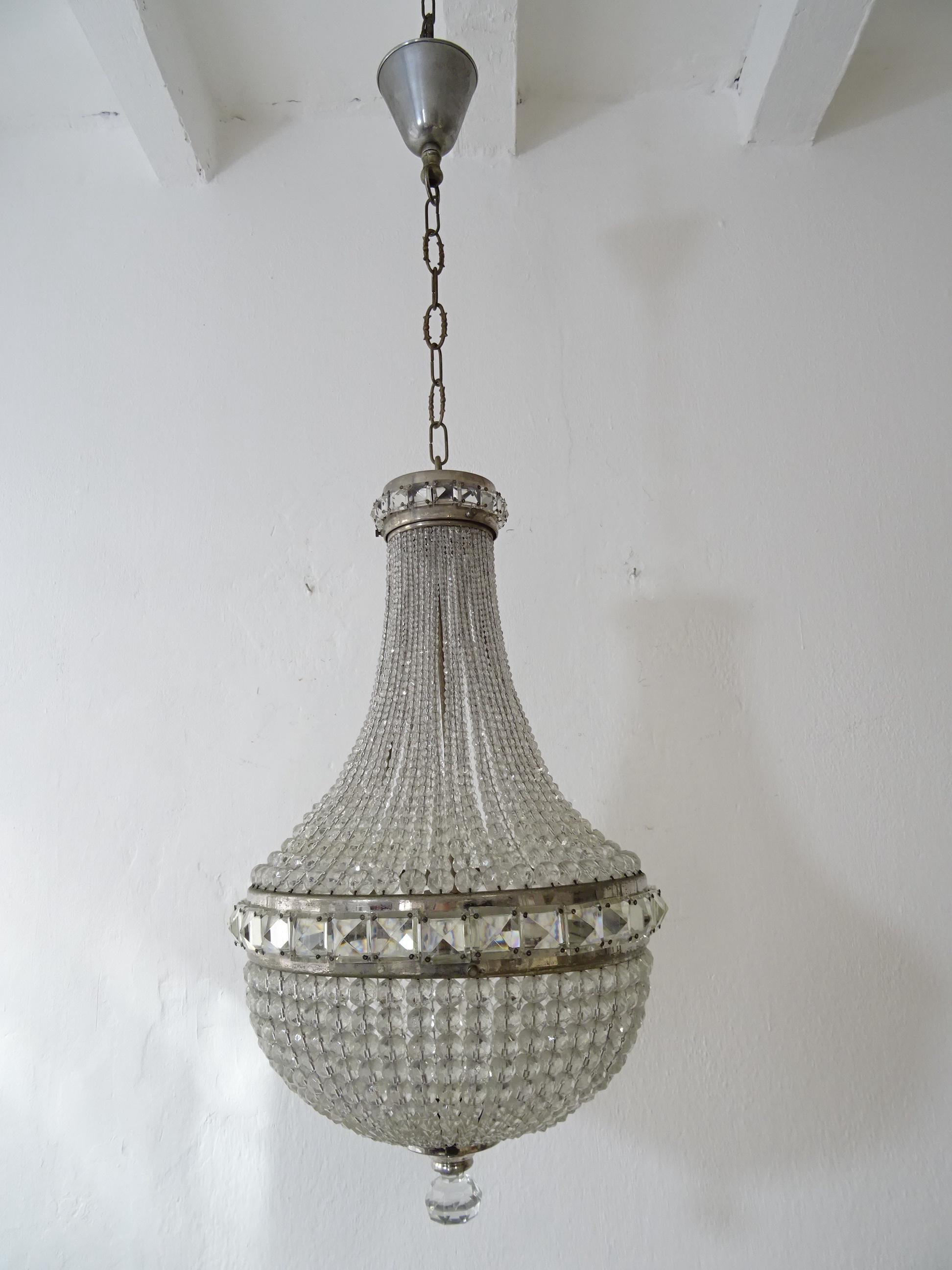 Housing one light, will be rewired and ready to hang. We use certified UL US sockets and appropriate sockets for all other countries. Strands and strands of crystal beads from tiny to big with crystal finial on bottom. Also adorning rare square