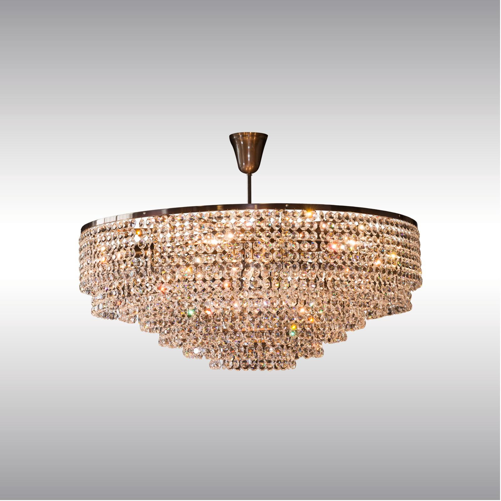 DARK Patina 
Most components according to the UL regulations, with an additional charge we will UL-list and label our fixtures

Big crystal chandelier in the style of the 1960ies, size of the roughly 2000 glass-stones is 30mm, the length of the stem