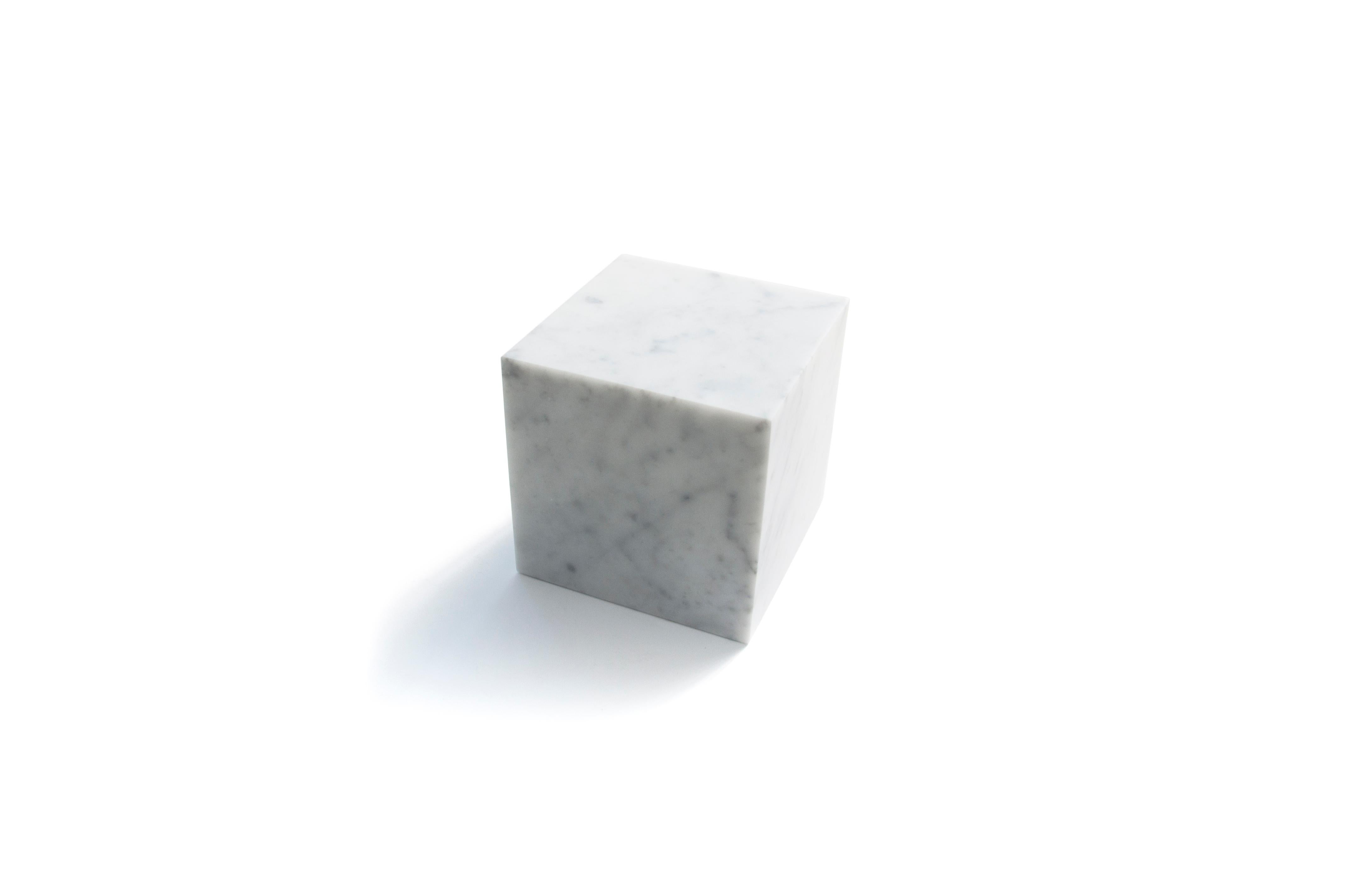Big decorative paperweight cube full in satin white Carrara marble. Each piece is in a way unique (every marble block is different in veins and shades) and handmade by Italian artisans specialized over generations in processing marble. Slight