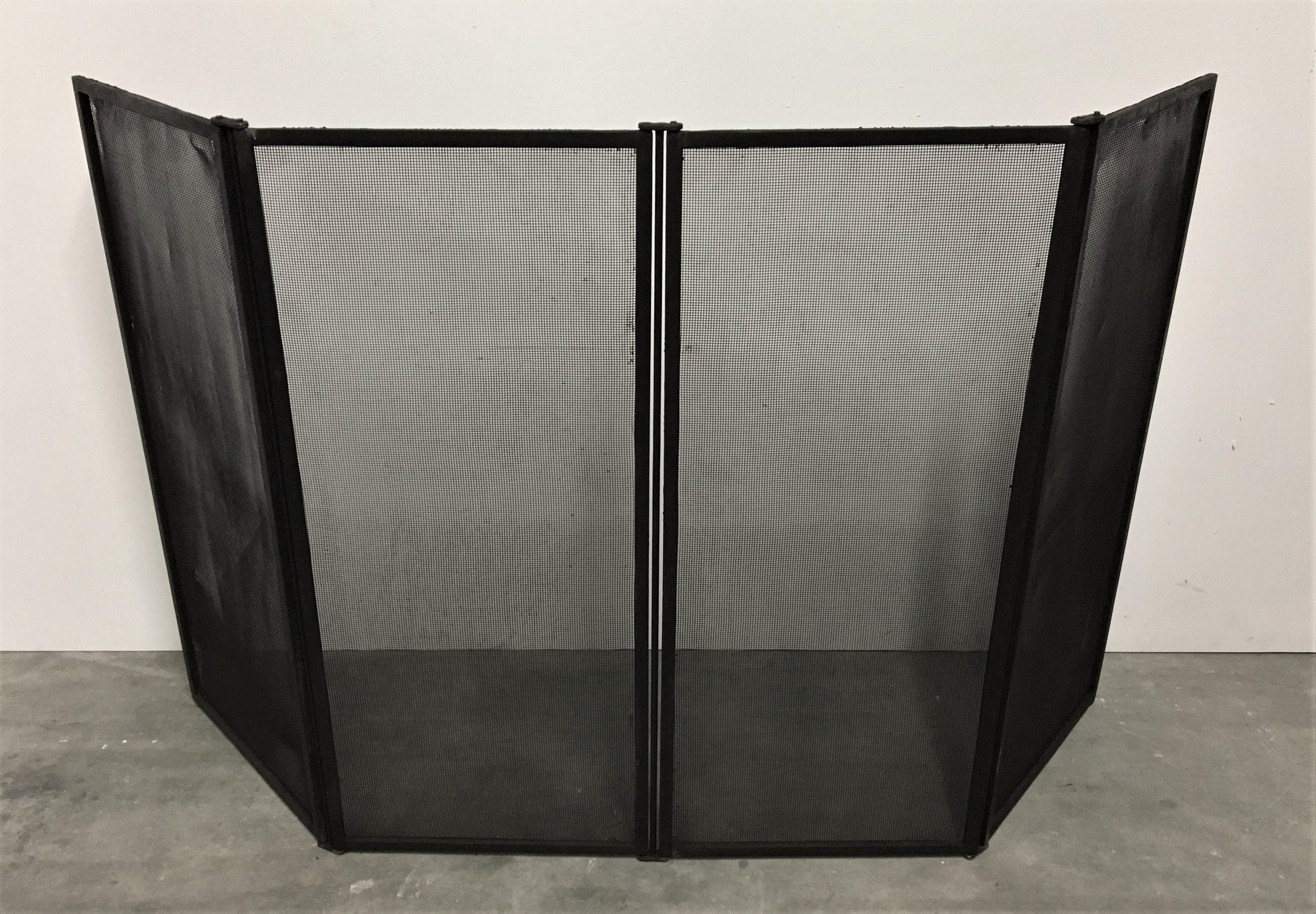 This big fireplace screen / fire screen is rare because of its size.
This is in great condition with a beautiful original patina, thanks to the 4 panels the screen can be used in a range of widths to fit your fireplace. 

Our vast collection of