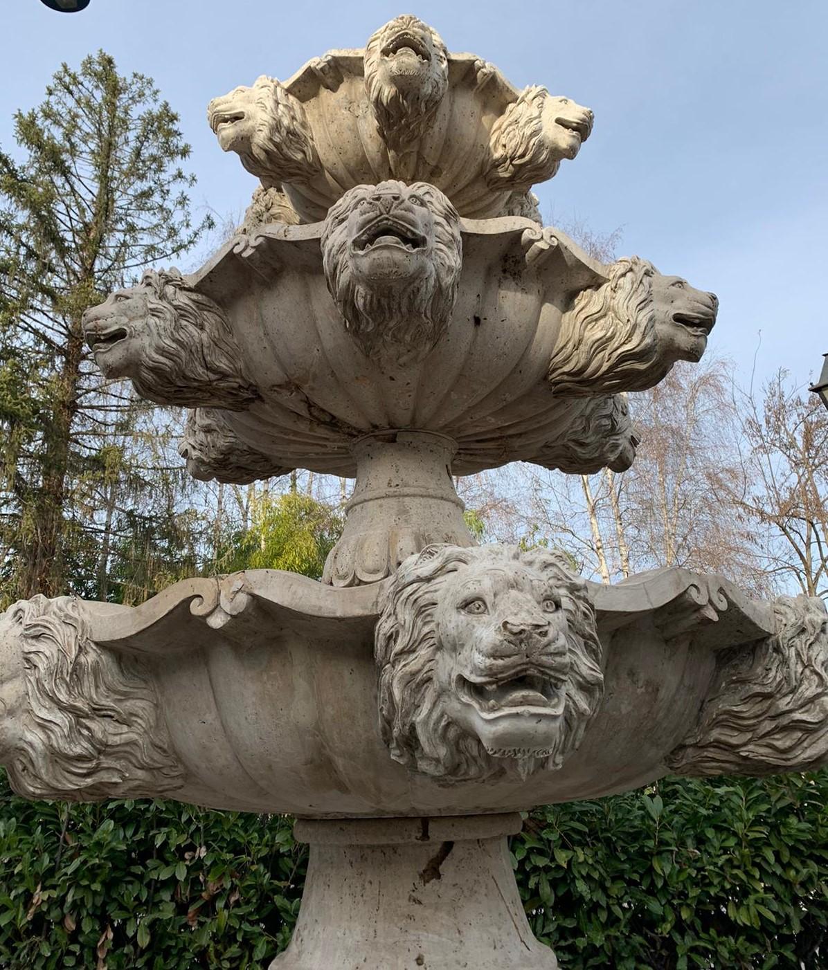 Large fountain in Travertine stone, imposing and richly carved with rampant horses, lion faces and three raised basins above the base on a central column also sculpted, built and sculpted by hand in the 1980s in Italy.
Consisting of three basins