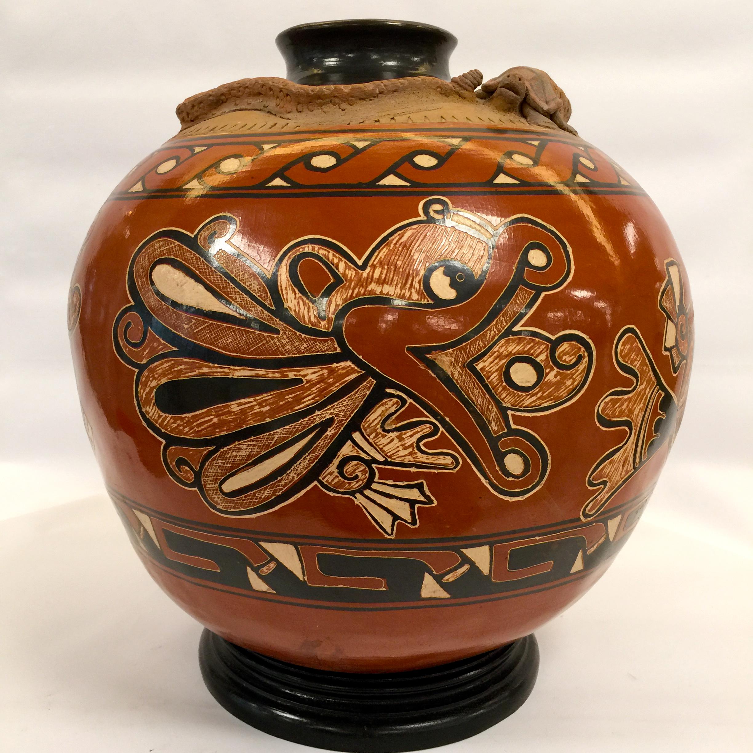 Incredible big funerary urn from the Tupinambas Brazilian tribe hand painted with frog, turtle and rattlesnake applied.